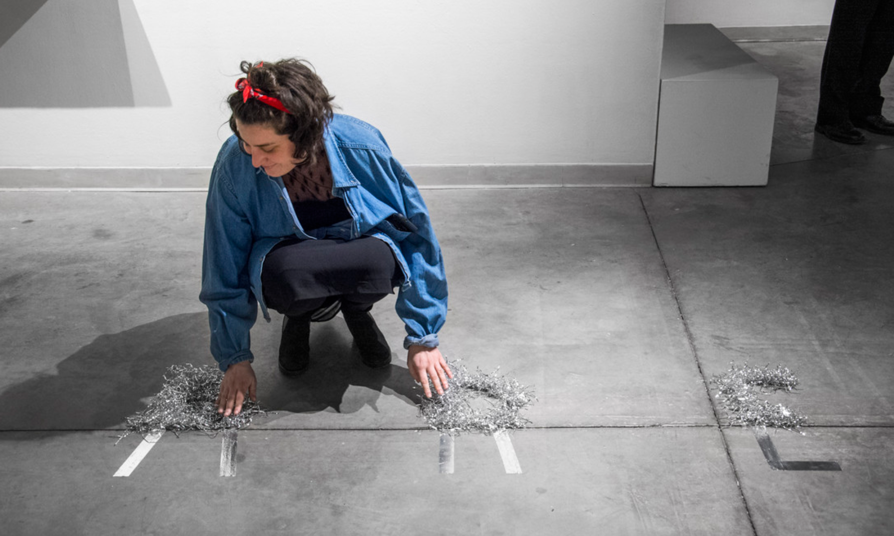 Artist and Curator Zoe Cinel with her work