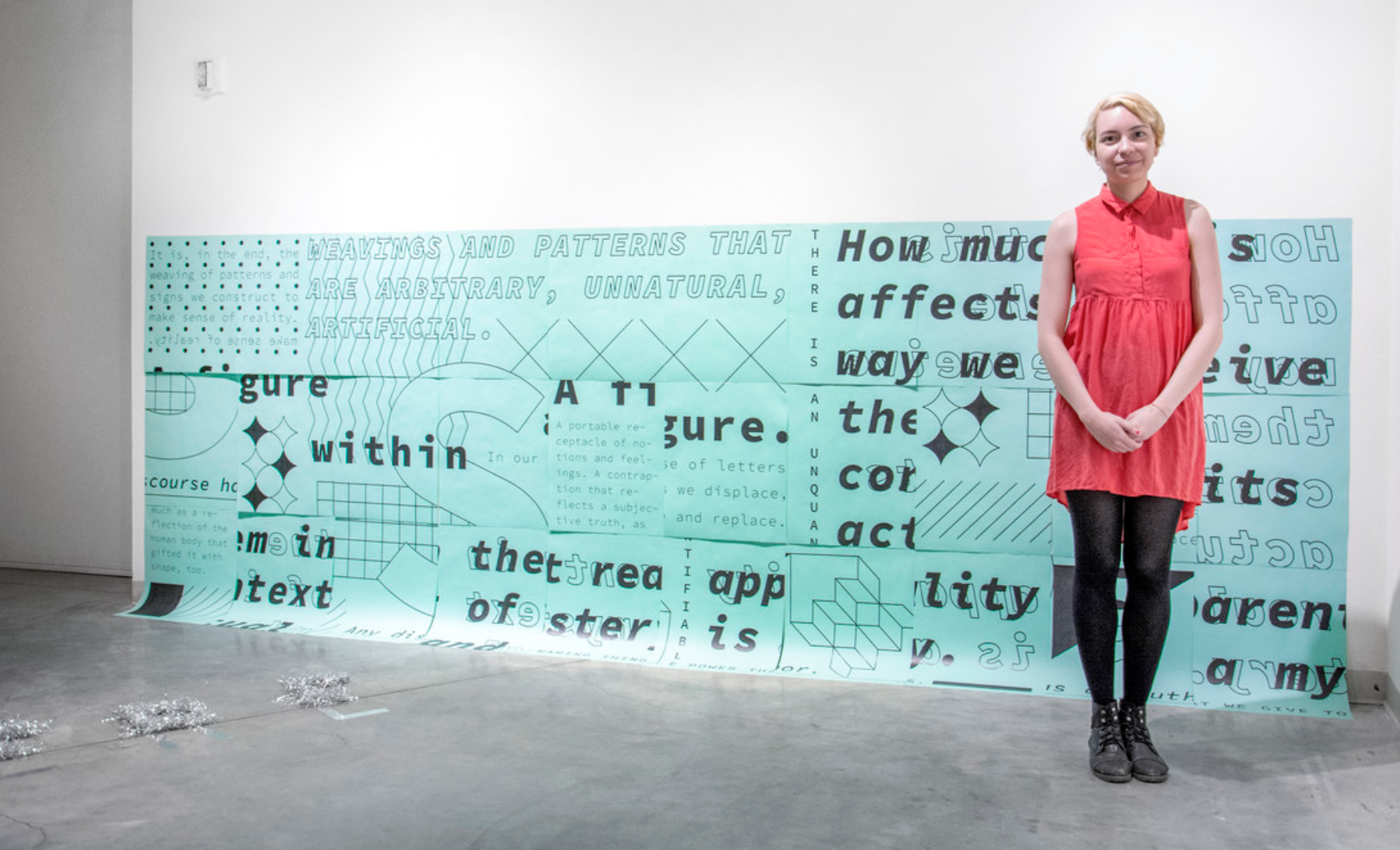Artist Frankie Castillo with their work