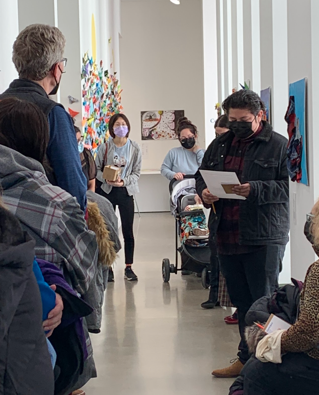 Artist Alexis Pena-Ciegos leads a tour