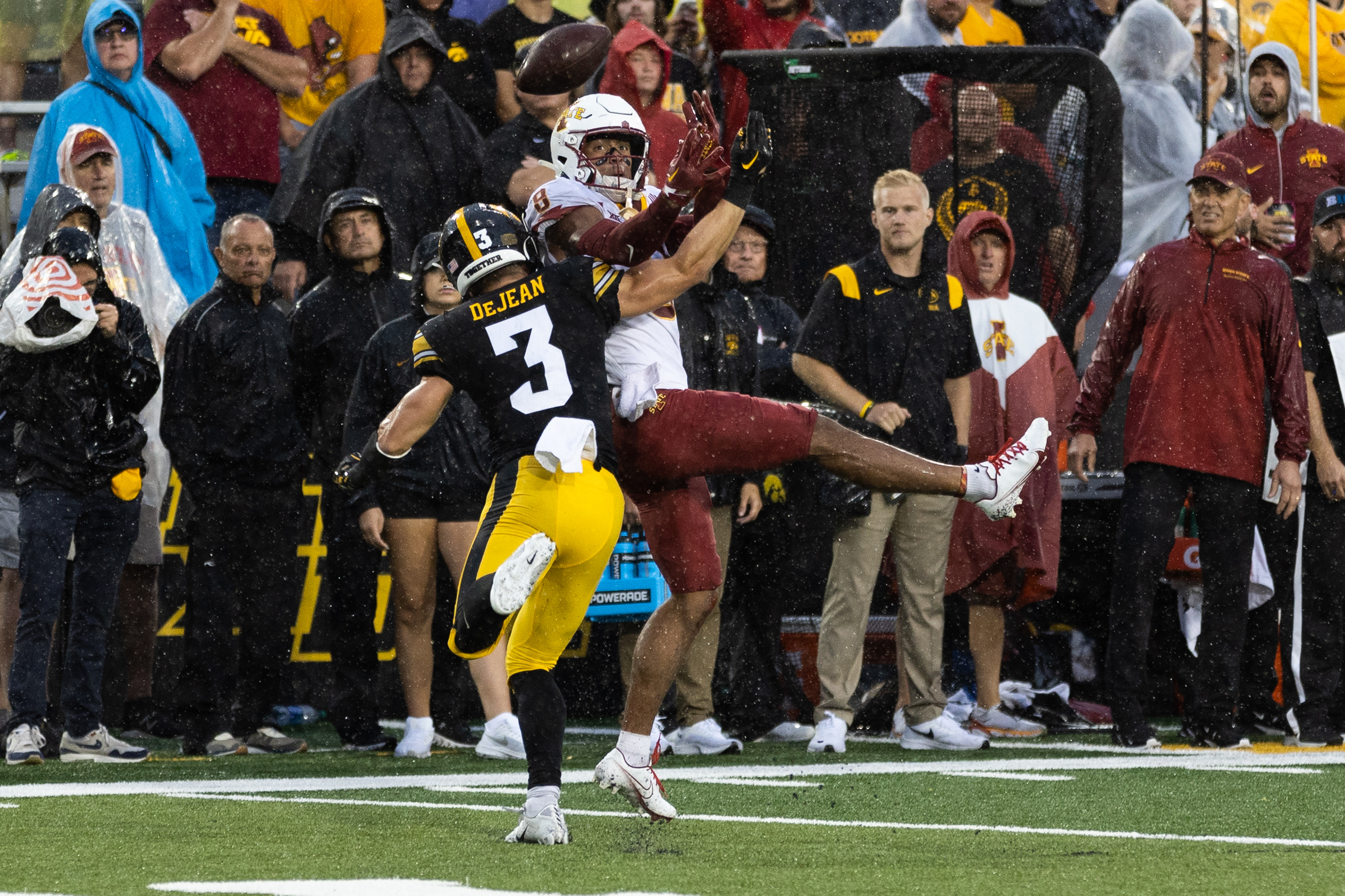 Iowa State Cyclones wide receiver Xavier Hutchinson (8) catches a pass under pressure by Iowa Hawkeyes defensive back Cooper DeJean (3) during a NCAA football game between the Iowa Hawkeyes and the Iowa State Cyclones at Kinnick Stadium in Iowa City, Iowa on Saturday, Sept. 10, 2022.
