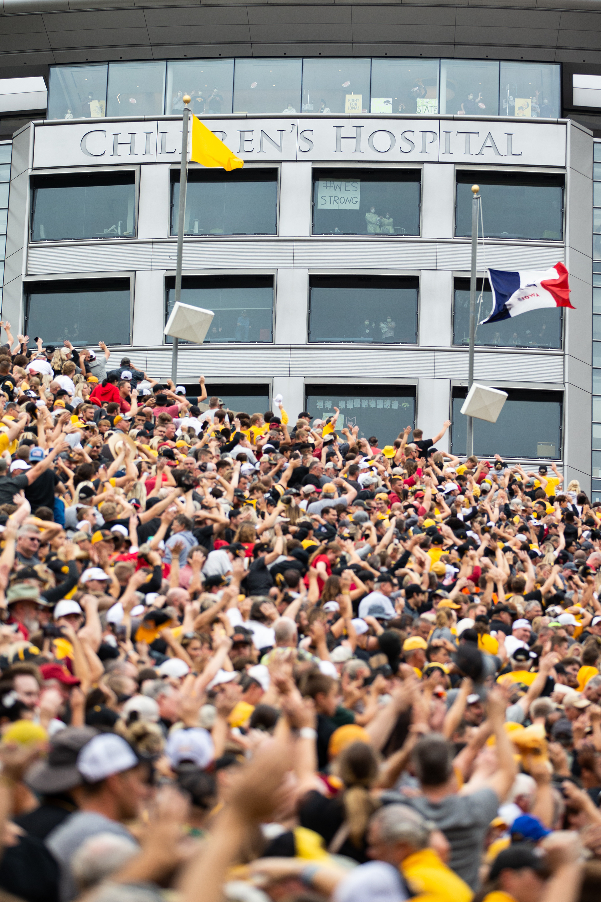 Fans wave to the University of Iowa Stead Family Children's Hospital during a NCAA football game between the Iowa Hawkeyes and the Iowa State Cyclones at Kinnick Stadium in Iowa City, Iowa on Saturday, Sept. 10, 2022.