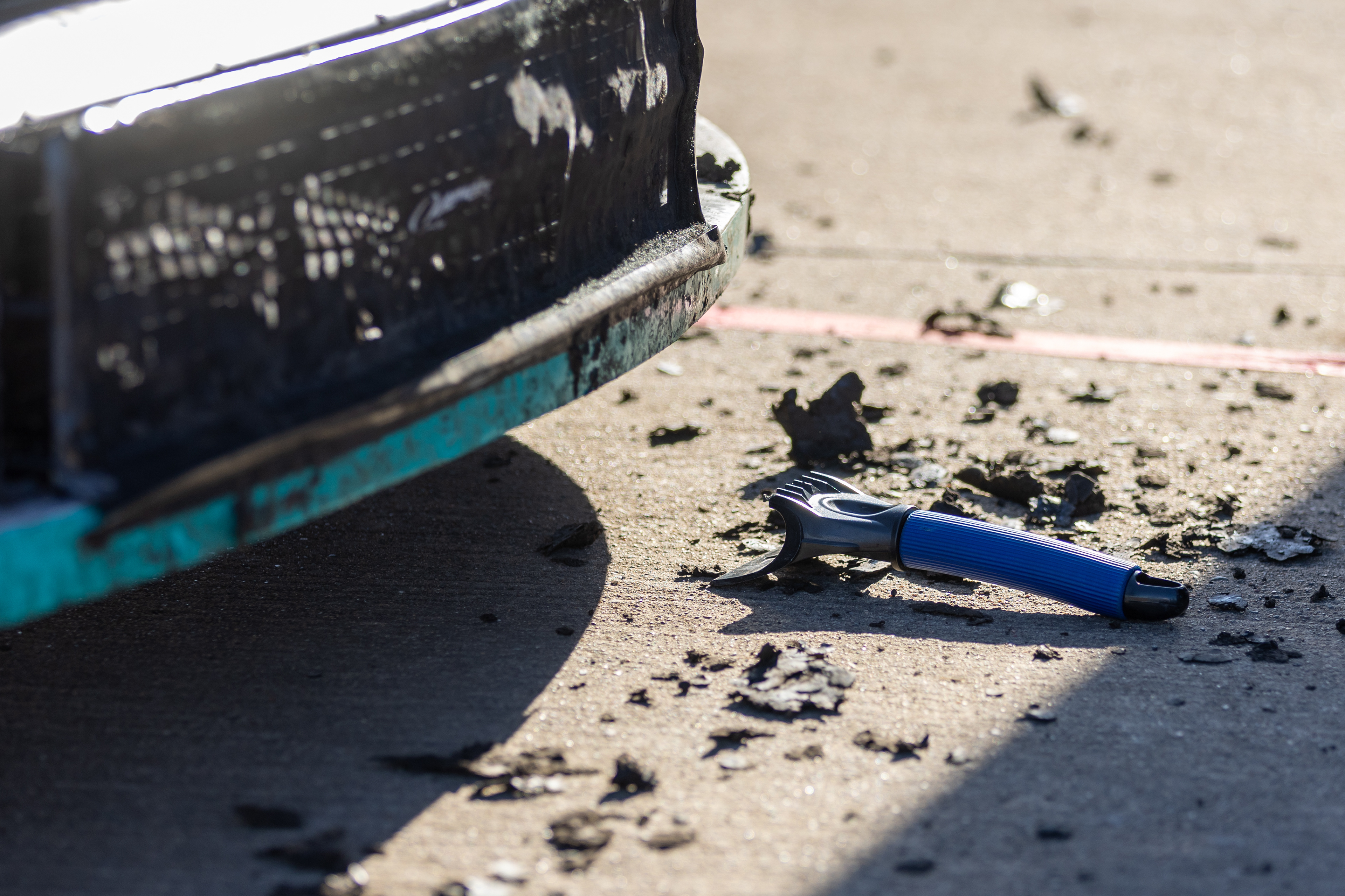 Mud debris lays in the garage after a driver returned from a practice session for the Clean Harbors 150 NASCAR Camping World Truck Series Race at Knoxville Raceway in Knoxville, Iowa on Friday, June 17, 2022.