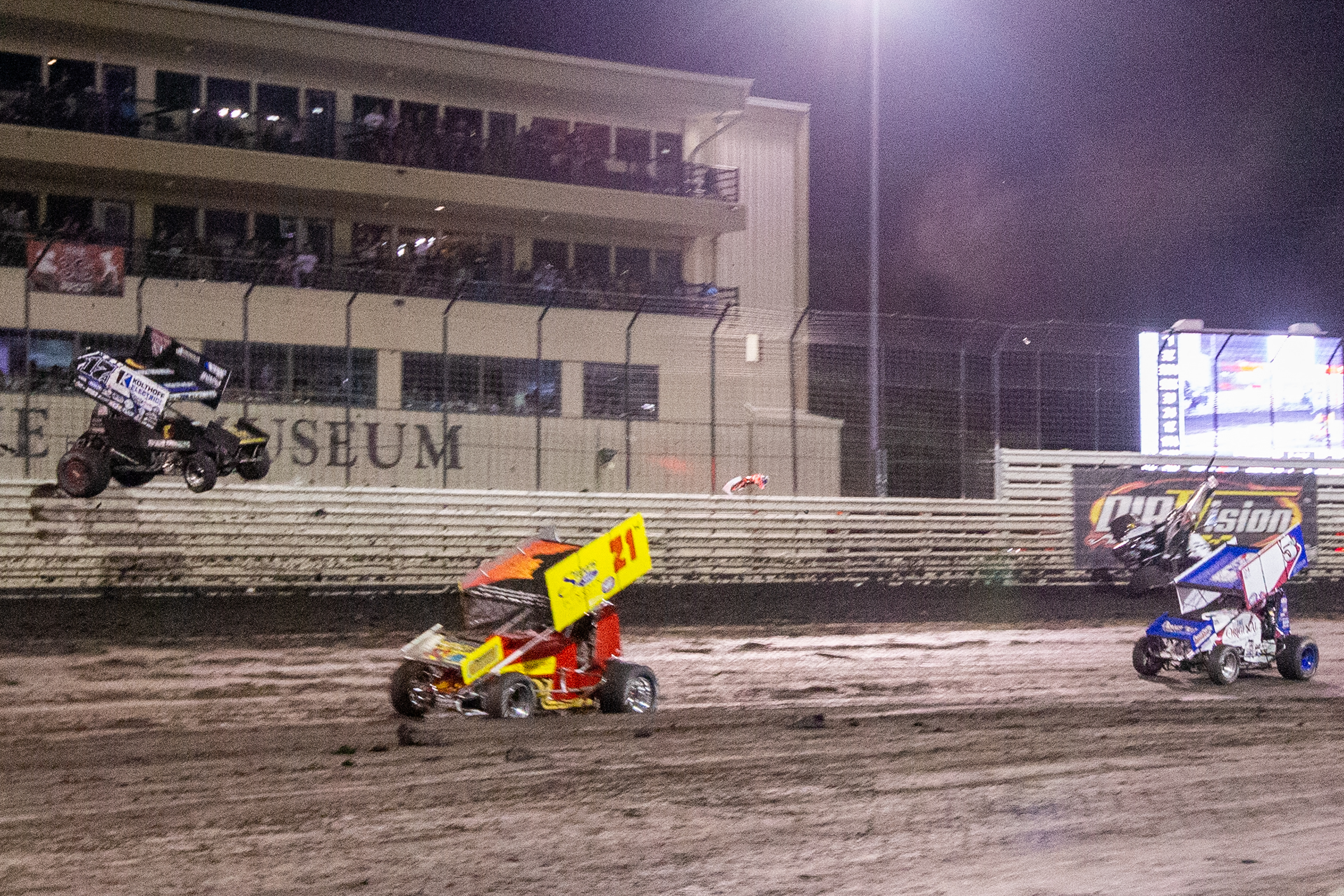 Austin McCarl (17a) crashes into the wall during FVP Friday Hard Knox Prelim Night of the 60th Annual NOS Energy Drink Knoxville Nationals presented by Caseys at Knoxville Raceway in Knoxville, Iowa on Friday, Aug. 13, 2021.
