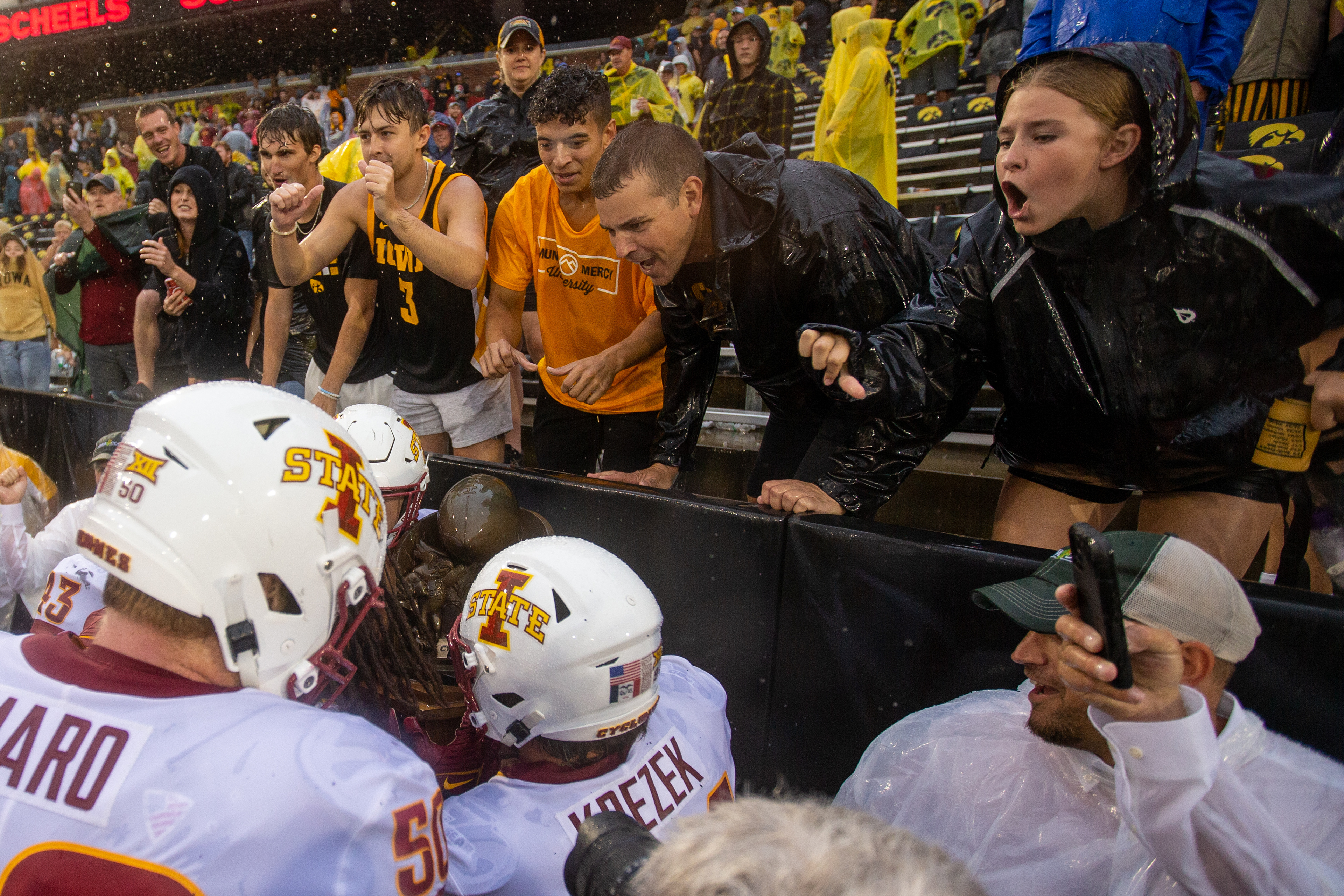 Iowa Hawkeyes fans acknowledge the Cyclones as they pick up the Cy-Hawk trophy during a NCAA football game between the Iowa Hawkeyes and the Iowa State Cyclones at Kinnick Stadium in Iowa City, Iowa on Saturday, Sept. 10, 2022.