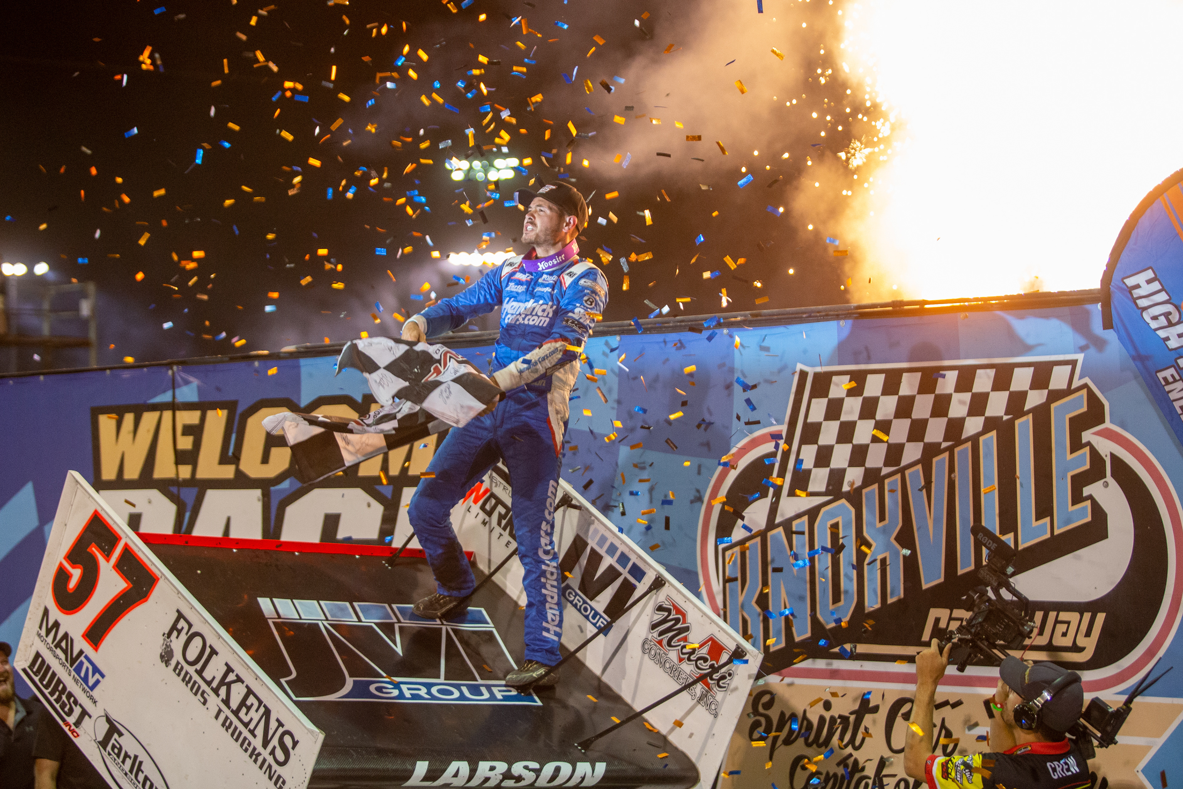 Kyle Larson (57), of Elk Grove, California, celebrates winning the 60th Annual NOS Energy Drink Knoxville Nationals presented by Caseys Championship Night at Knoxville Raceway in Knoxville, Iowa on Saturday, Aug. 14, 2021.