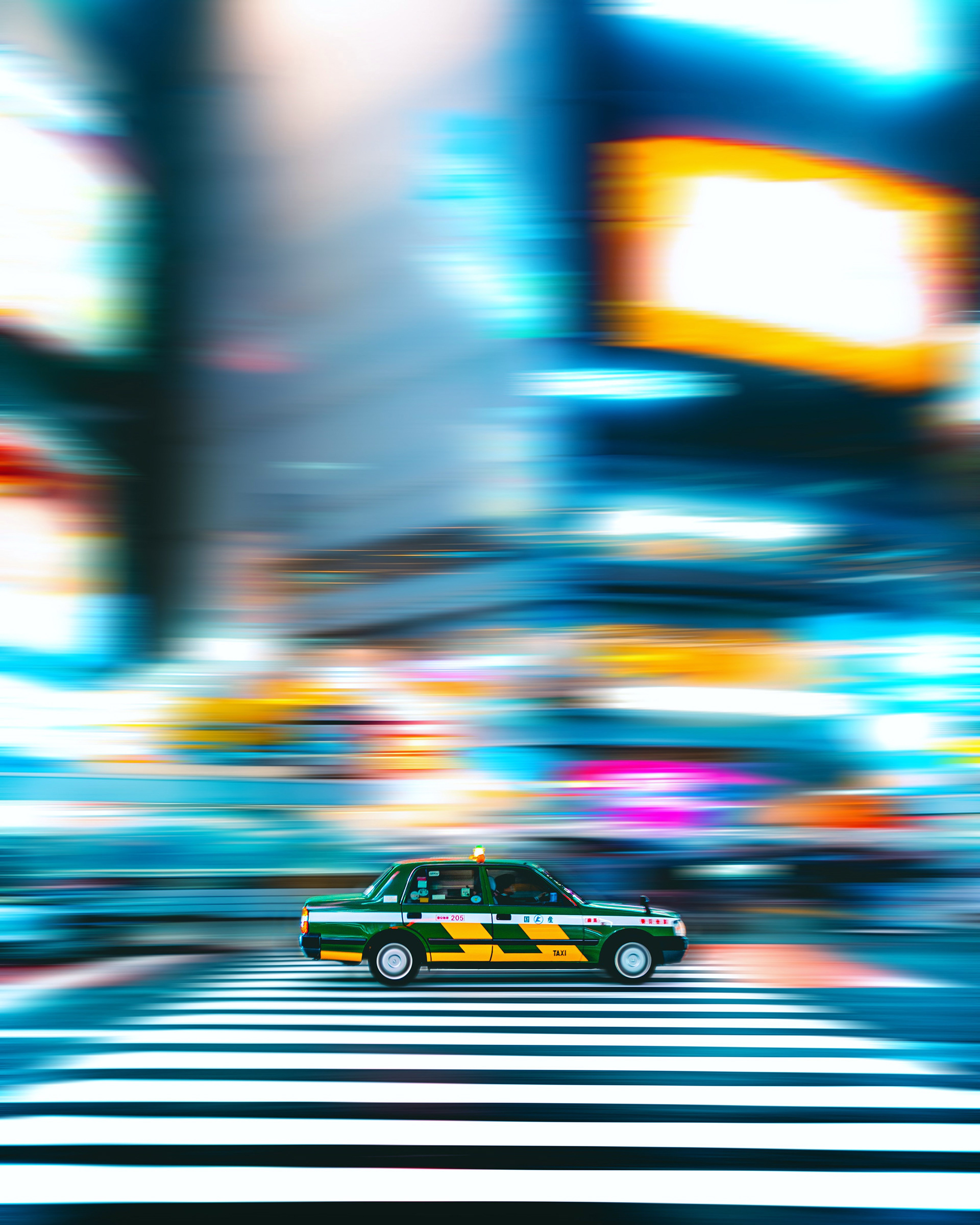 Taxi zipping through Shibuya Crossing  Tokyo, May 2025