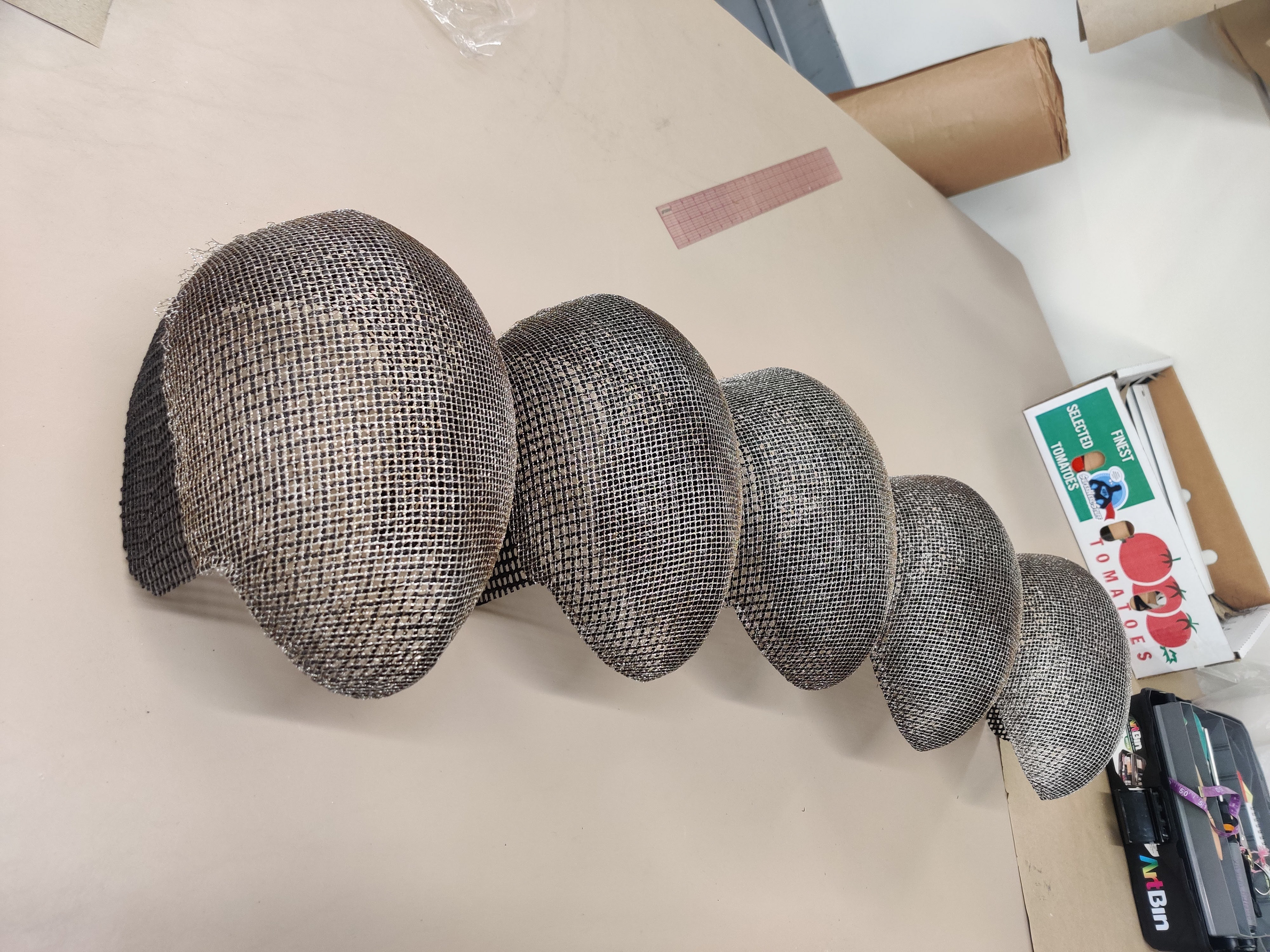 Metallic net hand sewn to Varaform base