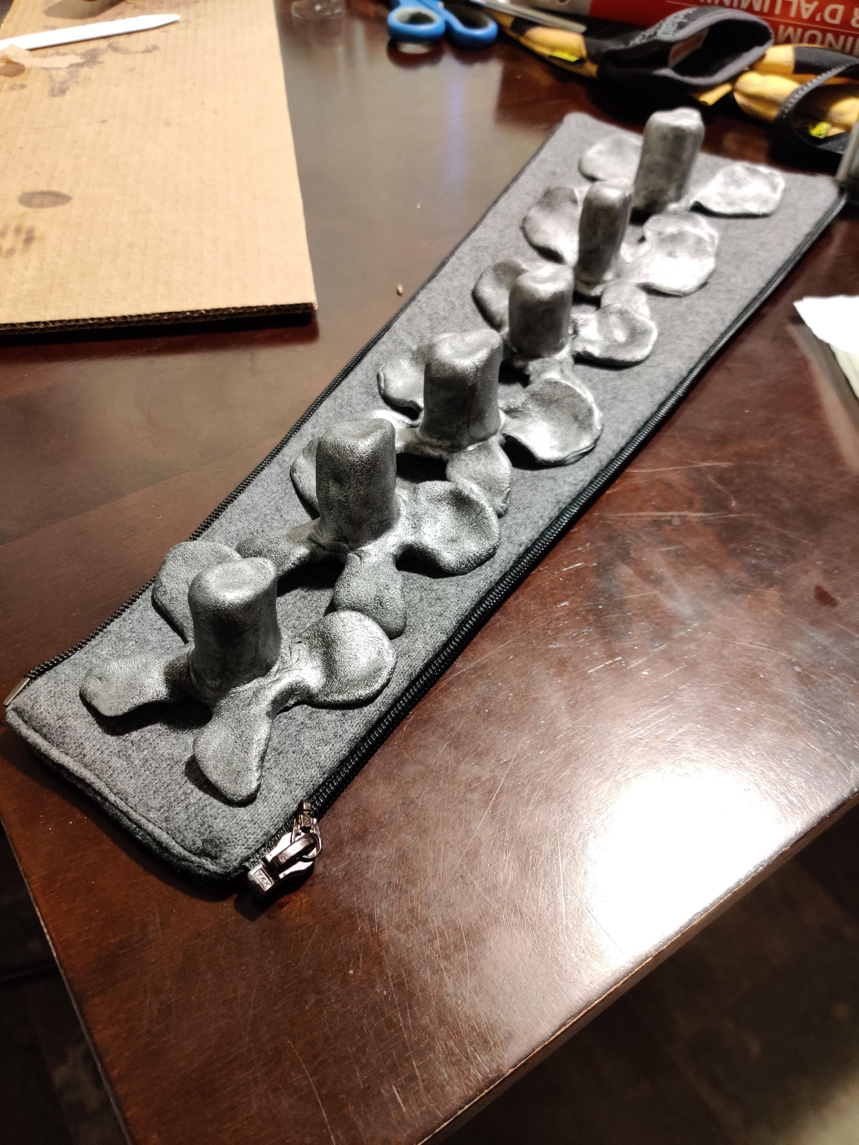 Final segments ready to be glued with hot glue and then added to the coat.