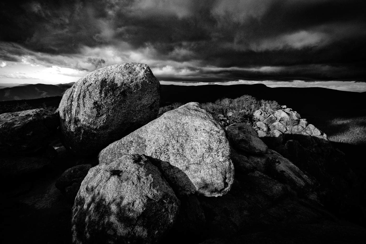 Storm clouds with boulders near summit of Old Rag Mountain