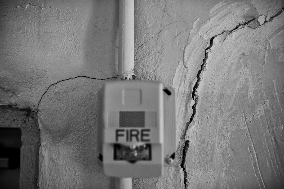 Cracked walls inside a school.