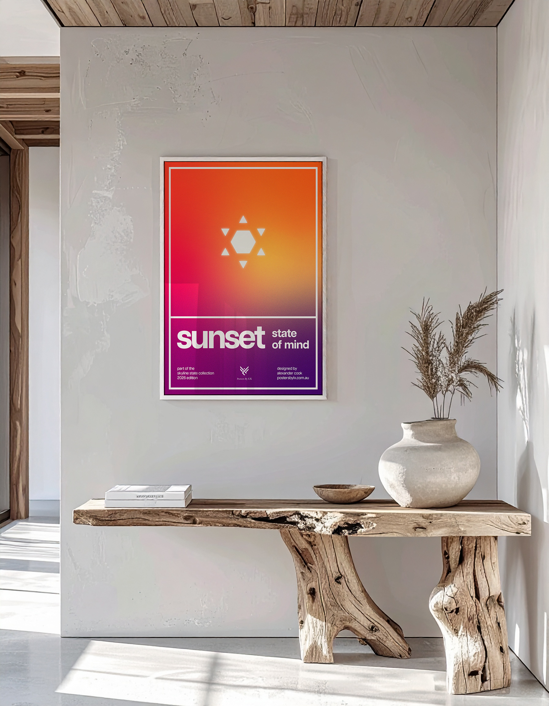 High-end interior mock-up of the 'Sunset State of Mind' print in a white frame on a textured wall and wooden bench.