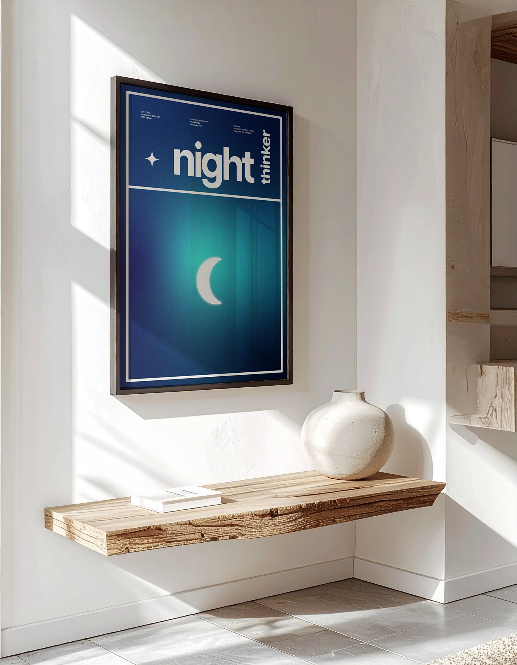 Luxury interior mock-up of the 'Night Thinker' poster in a black frame, hanging above a rustic wooden floating shelf.