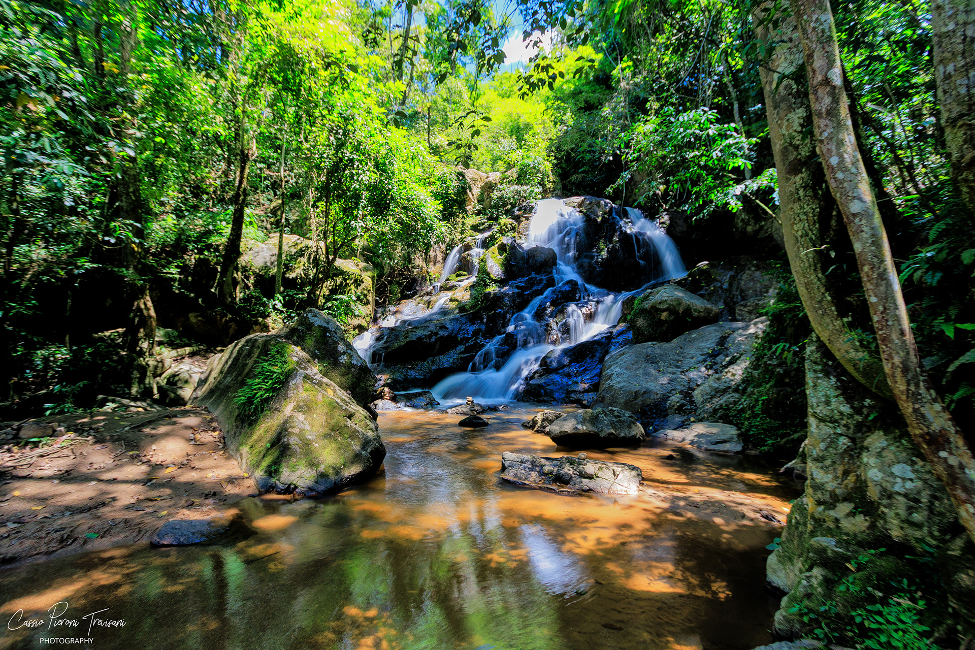 Surrounded by rich Atlantic Forest, Taboão cascades over layered rock — a study of texture, movement, and natural harmony.