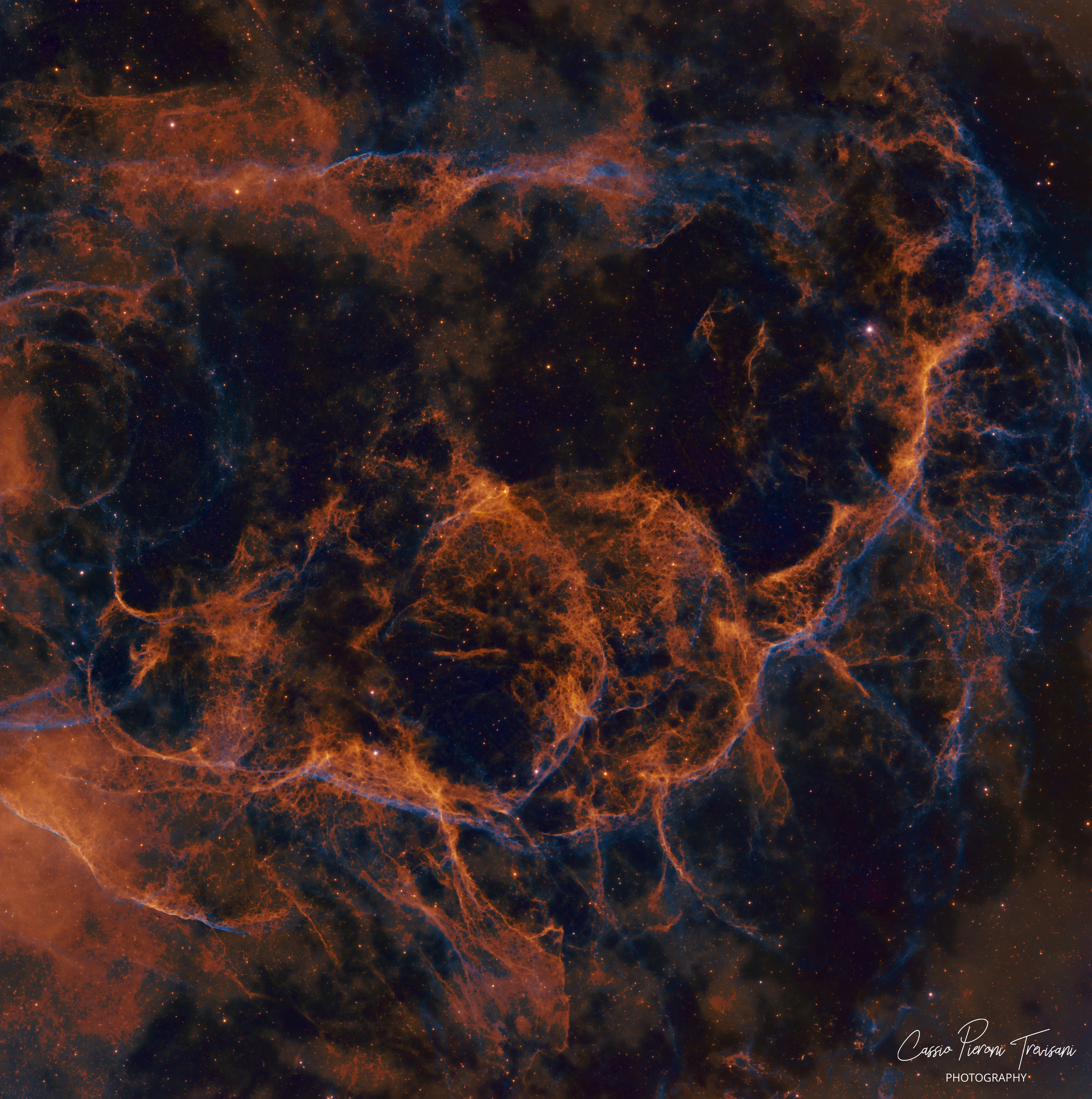 A close look into the tangled filaments of the Vela Supernova Remnant, presented in a narrowband SHO palette. This field is filled with delicate shock fronts, wispy arcs, and fractured shells left behind by an ancient stellar explosion.
