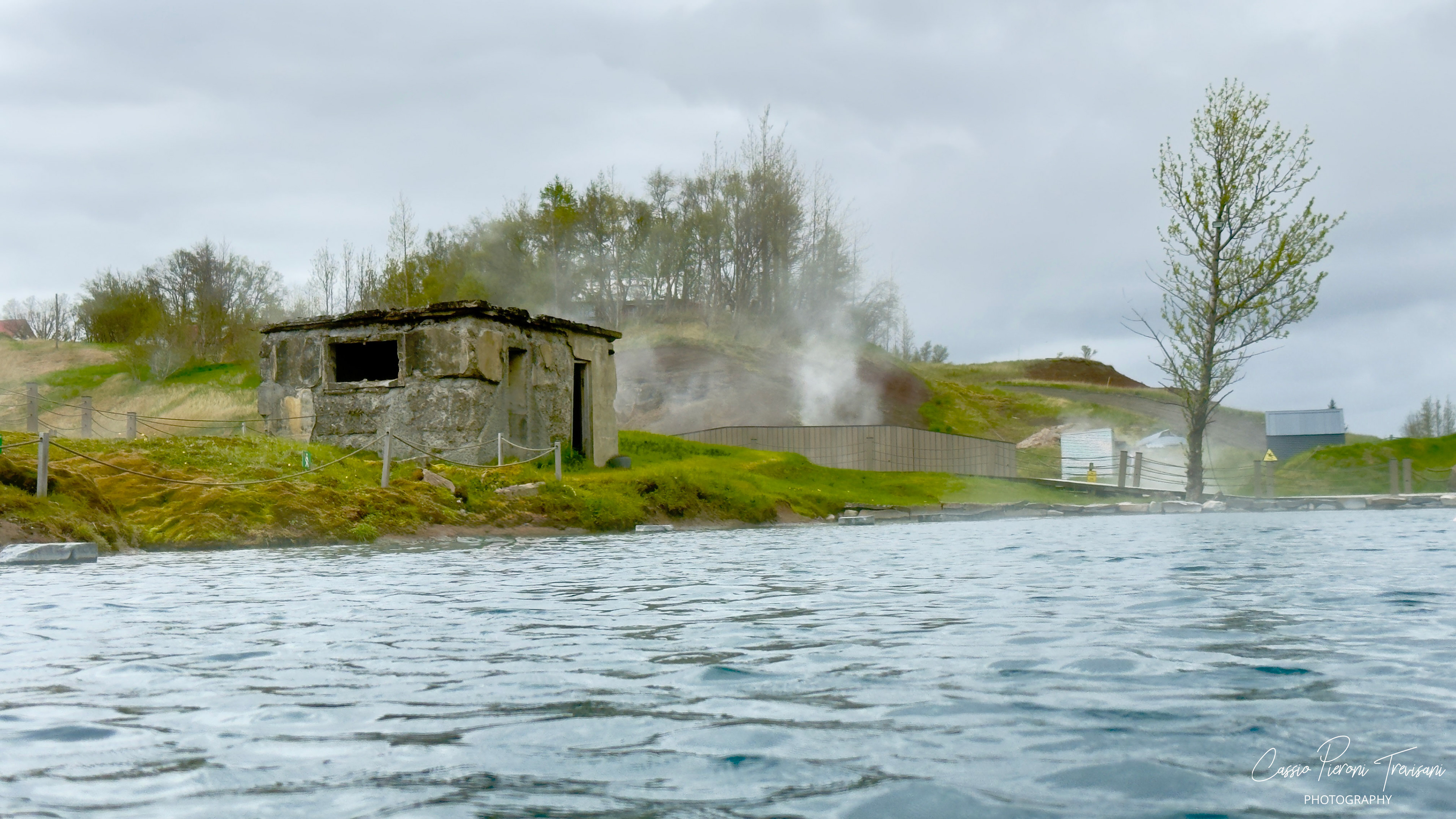 Gamla Laugin or the Secret Lagoon - Steam drifts across the warm waters of Secret Lagoon, where Iceland’s geothermal heat rises gently into the cool air of Flúðir.