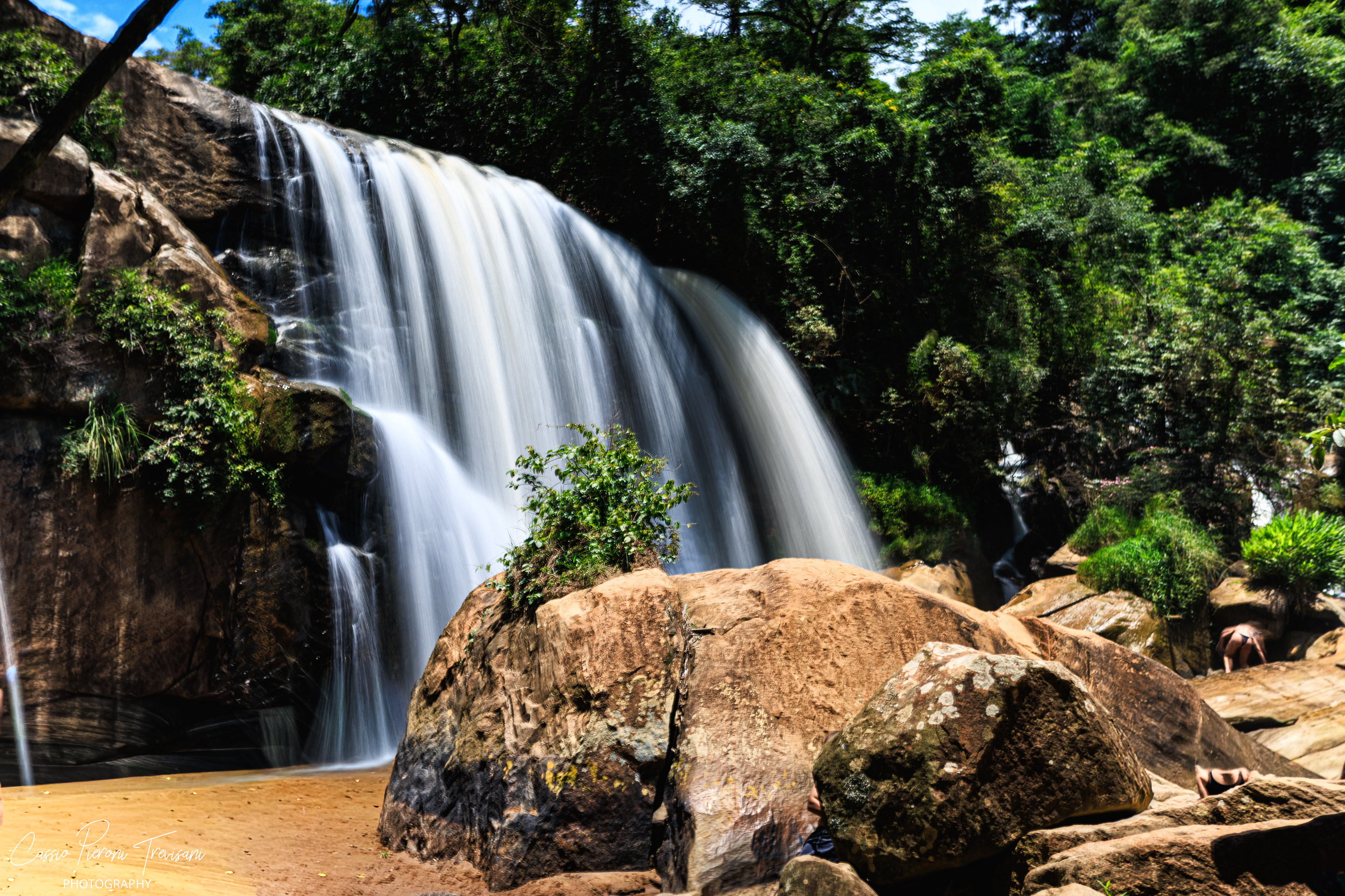 Waterfall Machado cascading in full force through the lush landscape of Minas Gerais, captured in long exposure to reveal its strength and fluidity.