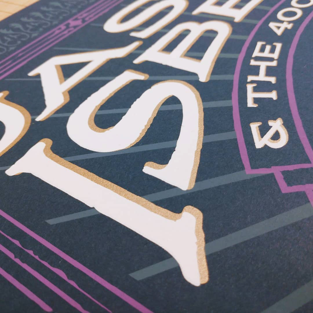 Detail showing metallic gold ink.