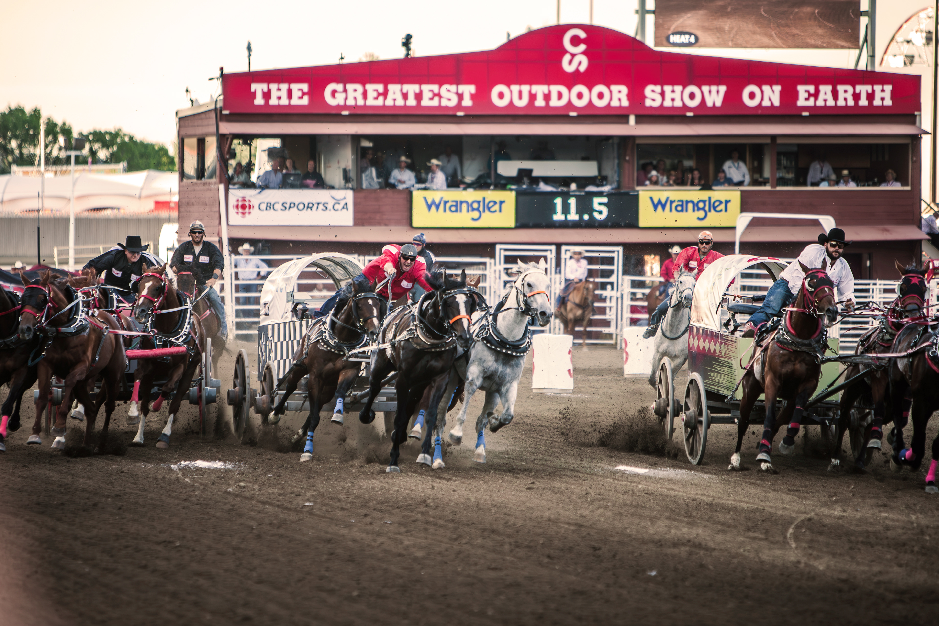 Jason Glass (in red) is a 4th generation champion chuckwagon driver.