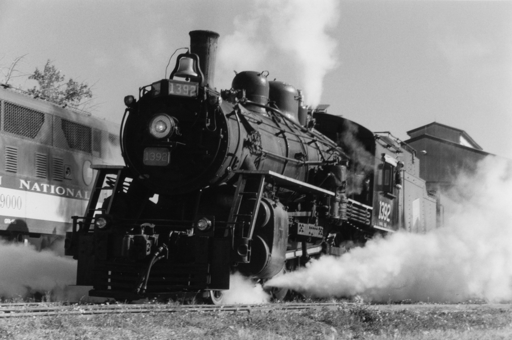 Northern Alberta Railway locomotive 1392 under steam at the Alberta Railway Museum northeast of Edmonton. I actually got to ride in this lovingly maintained machine back in 2005, standing where the fireman would - on a steel plate that bridged the locomotive to the tender.