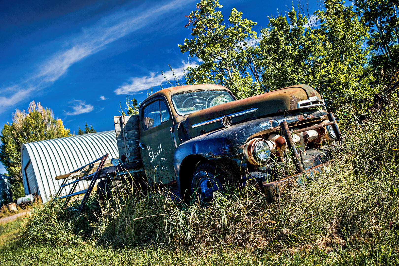 Travelling around Alberta’s heartland you'll find occasional accumulations of old cars and trucks left alone to be slowly reclaimed by nature. To me, these old relics are just fascinating subjects.