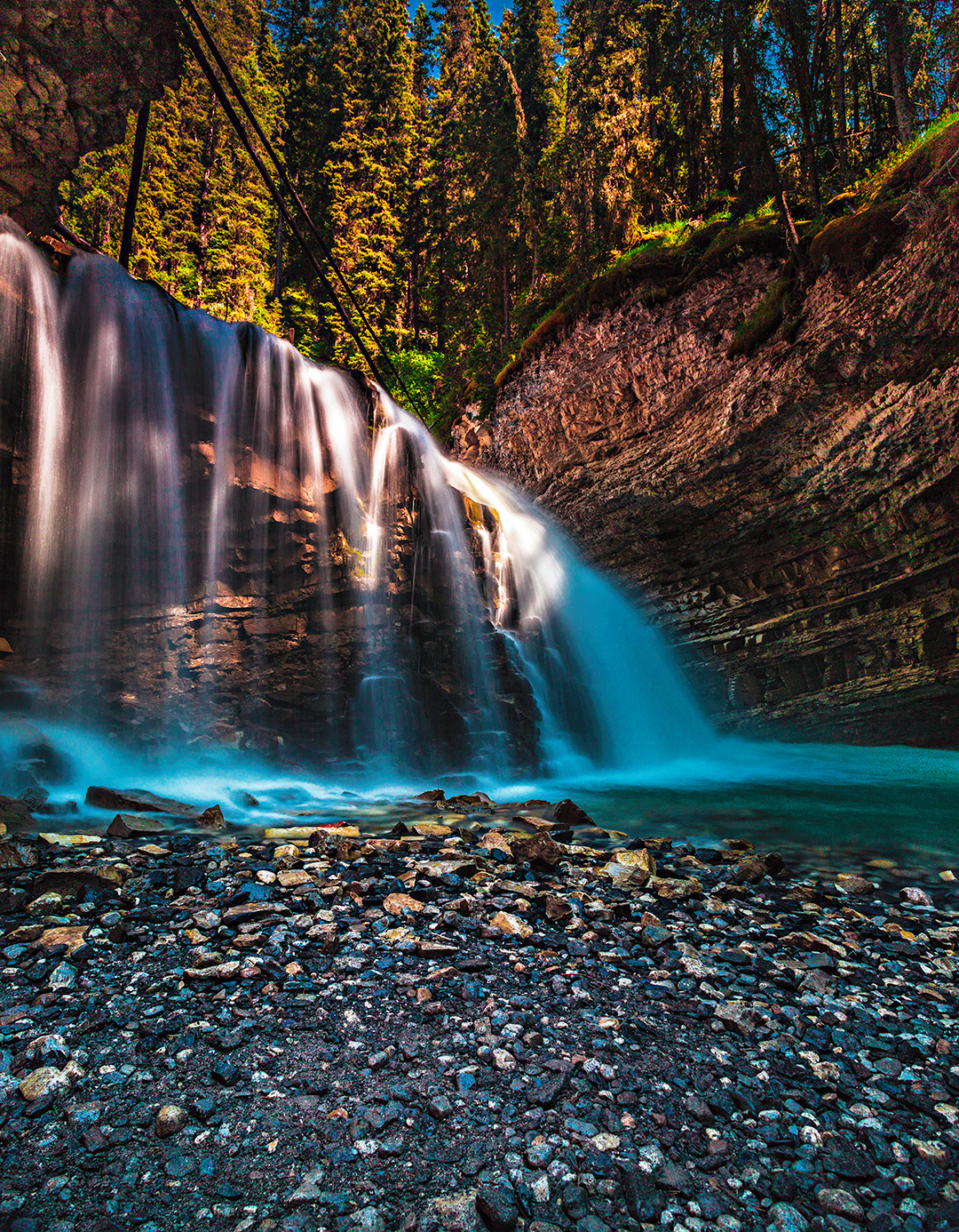Waterfall near Johnston Canyon Cave, between Lower and Upper Falls along the Johnston Canyon Trail in Banff National Park.