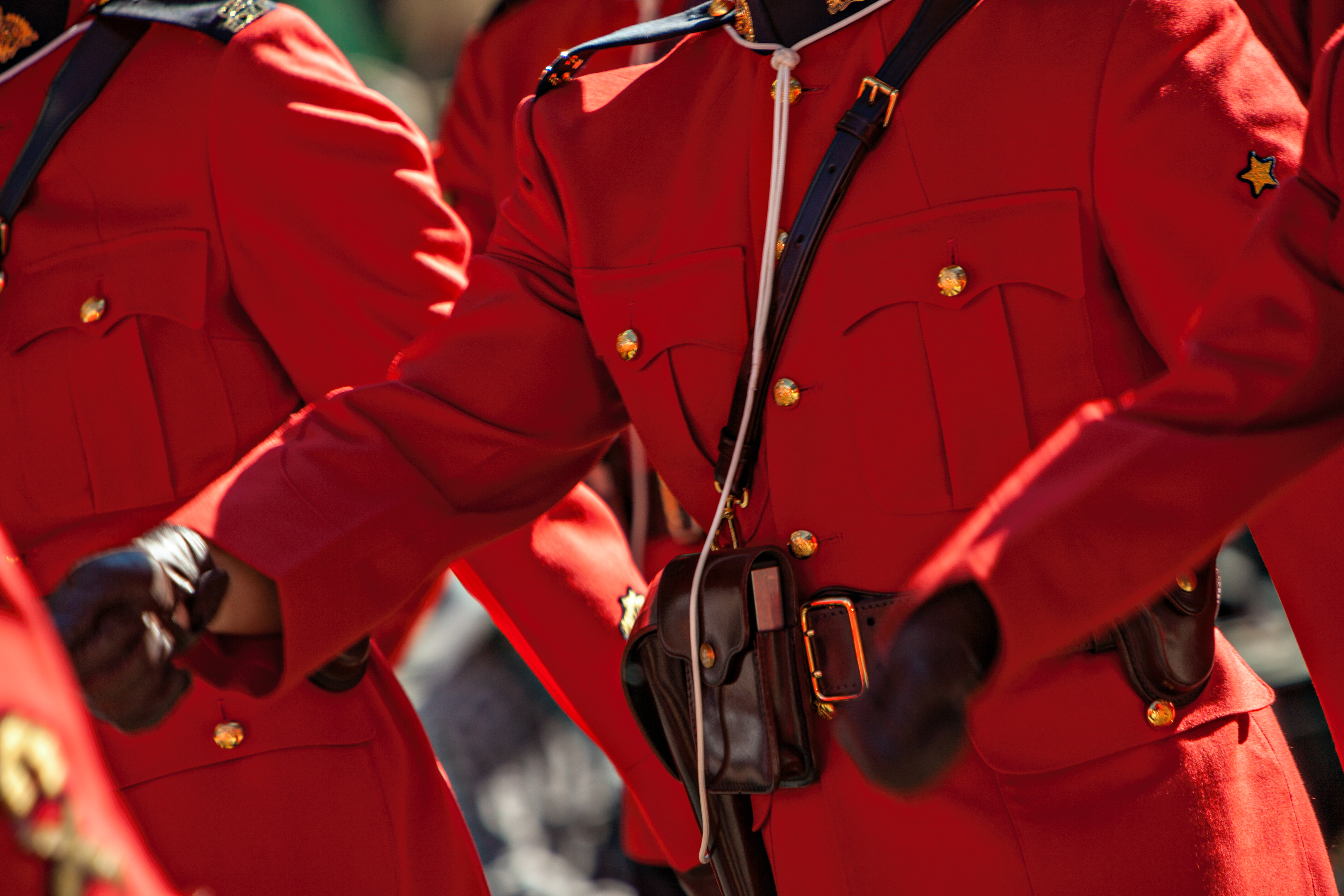 The Red Serge of the dress uniform of the Royal Canadian Mounted Police. Calgary Stampede Parade.