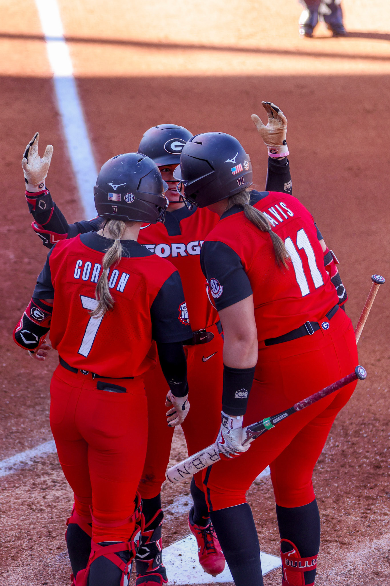 Georgia catcher and utility player Sarah Gordon (7), Georgia infielder and outfielder Jaydyn Goodwin (2), Georgia catcher Lyndi Rae Davis (11) during Georgia’s game against Stetson in the 2025 Bulldog Classic at Jack Turner Stadium in Athens, Ga., on Friday, Feb. 28, 2025. (Blake Caviness/UGAAA)