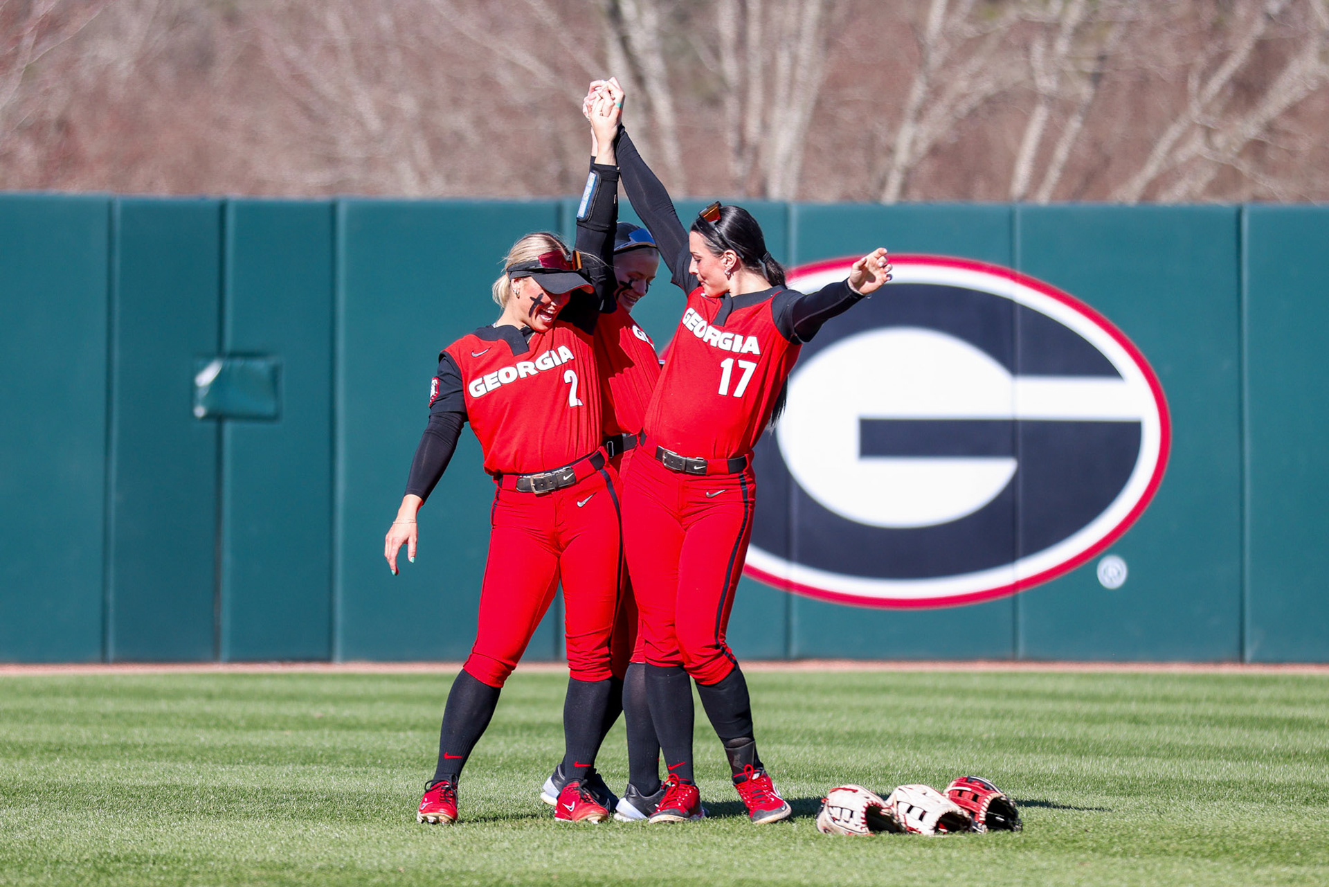 Georgia infielder and outfielder Jaydyn Goodwin (2), Georgia outfielder Dallis Goodnight (1), Georgia utility player Emma Castorri (17) before Georgia’s game against Stetson in the 2025 Bulldog Classic at Jack Turner Stadium in Athens, Ga., on Friday, Feb. 28, 2025. (Blake Caviness/UGAAA)