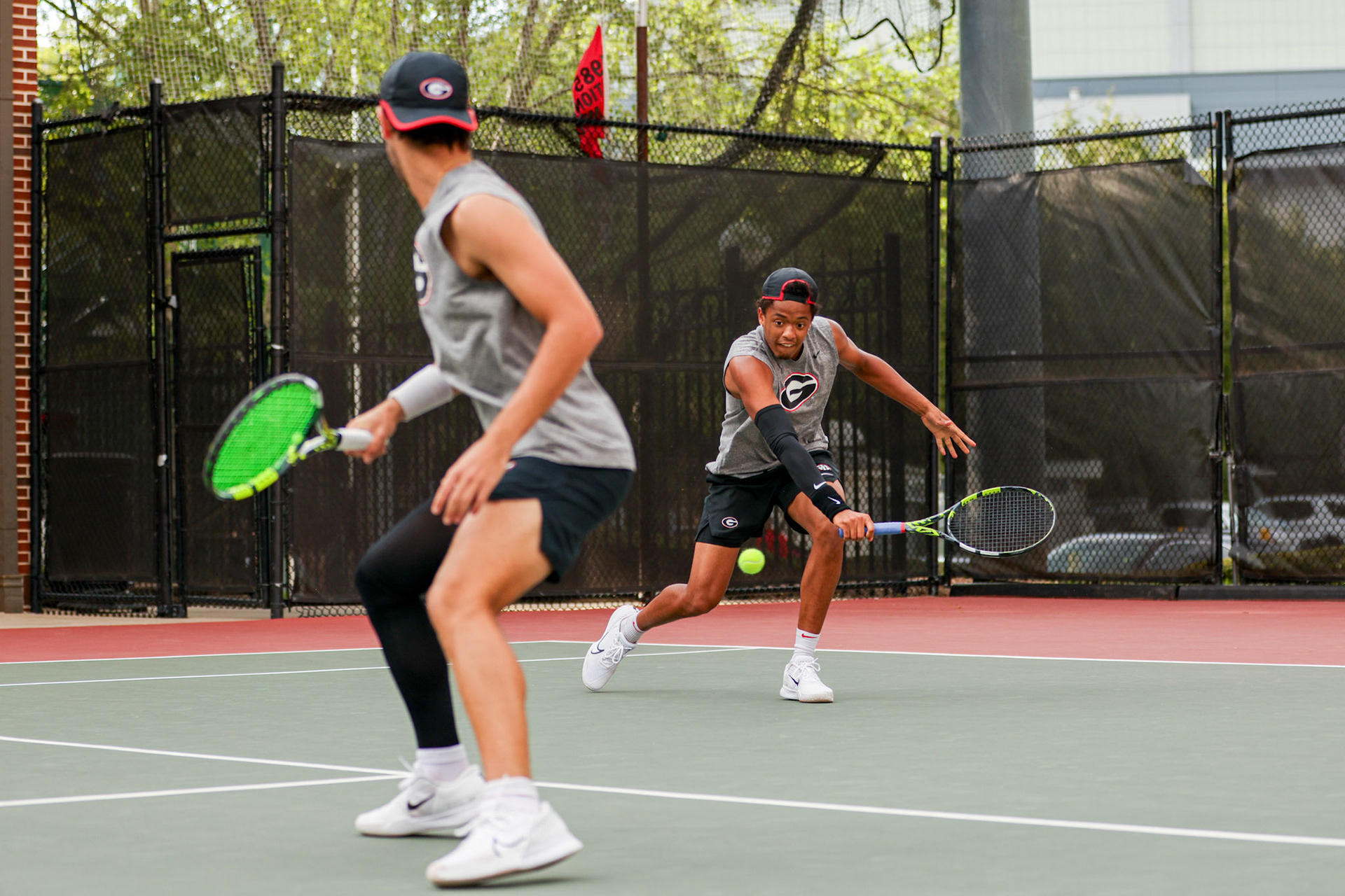 Georgia tennis player Oscar Pinto Sansano, Georgia tennis player Niels Ratiu during Georgia’s match against Texas at the Henry Field Stadium at the Dan Magill Tennis Complex in Athens, Ga., on Friday, April 11, 2025. (Blake Caviness/UGAAA)