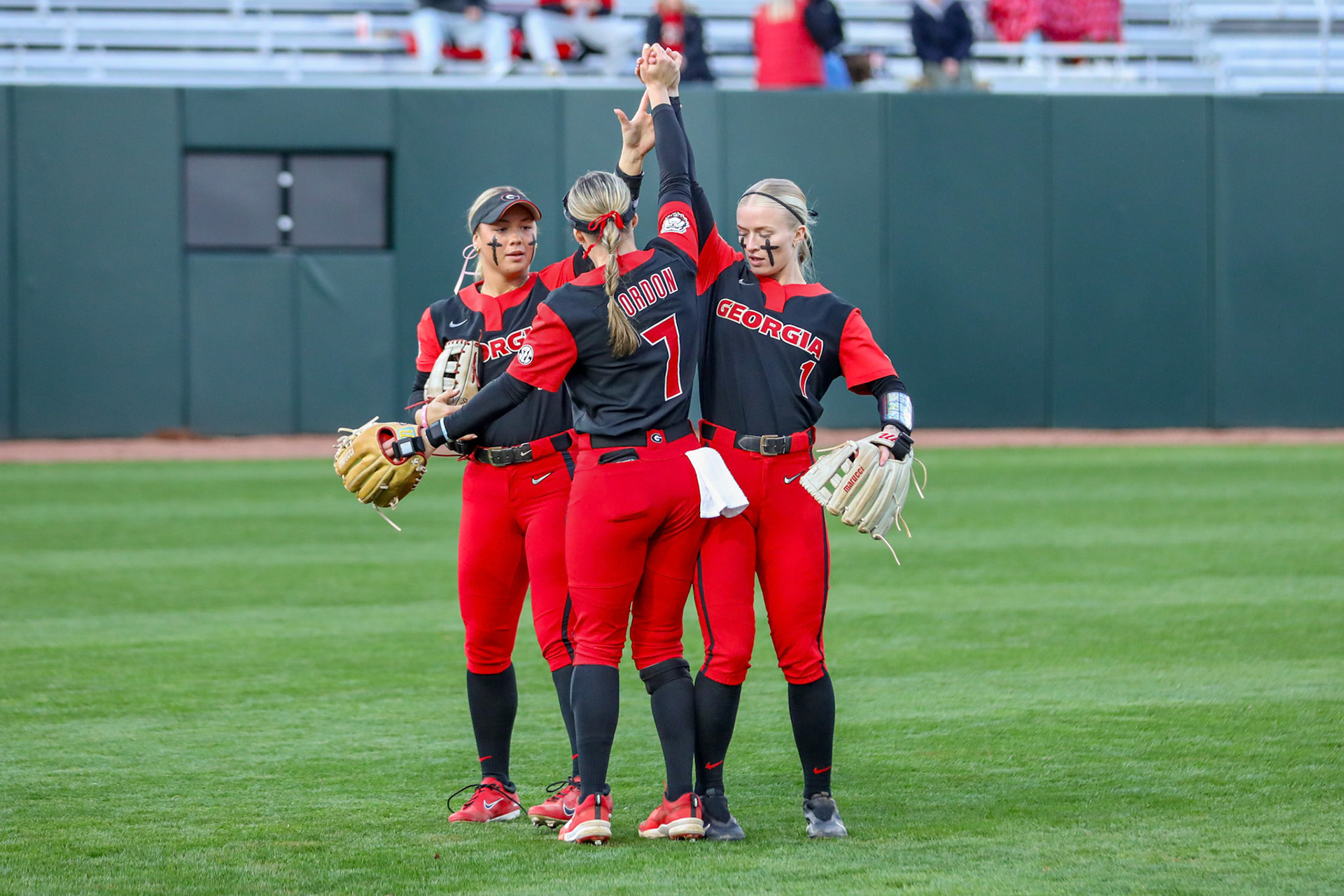Georgia infielder and outfielder Jaydyn Goodwin (2), Georgia catcher and utility player Sarah Gordon (7), Georgia outfielder Dallis Goodnight (1) before Georgia’s game against Michigan State in the 2025 Red &amp; Black Showcase presented by T-Mobile at Jack Turner Stadium in Athens, Ga., on Friday, Feb. 14, 2025. (Blake Caviness/UGAAA)