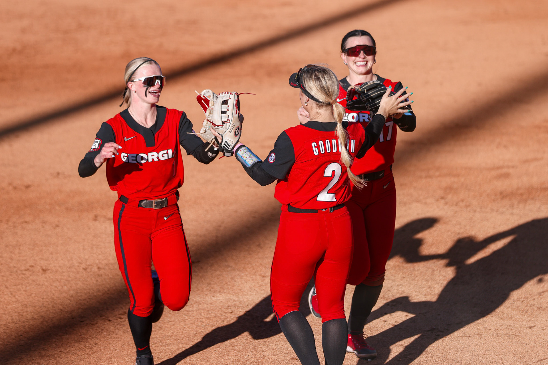 Georgia outfielder Dallis Goodnight (1), Georgia infielder and outfielder Jaydyn Goodwin (2), Georgia utility player Emma Castorri (17) during Georgia’s game against Stetson in the 2025 Bulldog Classic at Jack Turner Stadium in Athens, Ga., on Friday, Feb. 28, 2025. (Blake Caviness/UGAAA)