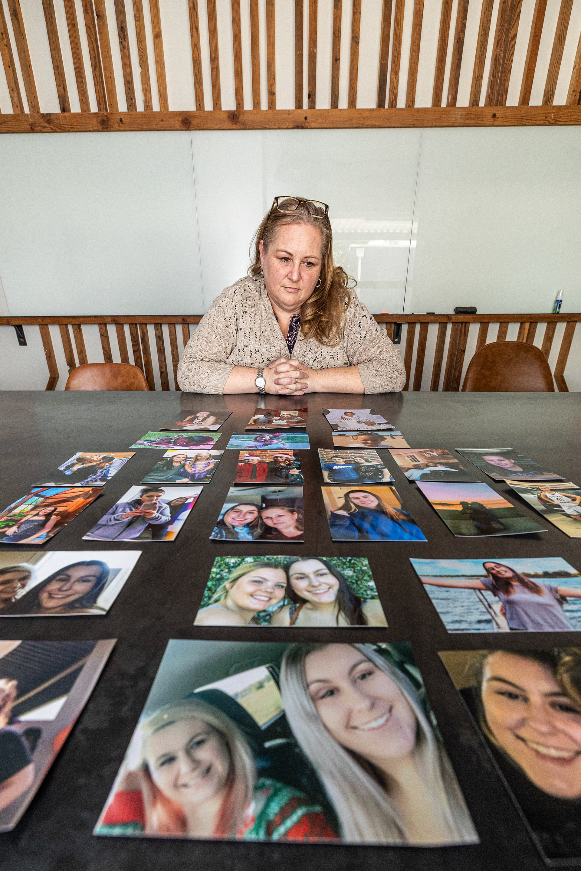 Andrea McCutcheon looks at photos of her daughter Valerie Vineyard, who died from a fentanyl overdose on May 27, 2021 at the age of 19. Vineyard and her boyfriend were both found unconscious the morning after they decided to take a Percocet pill. Vineyard’s boyfriend survived, but she did not.