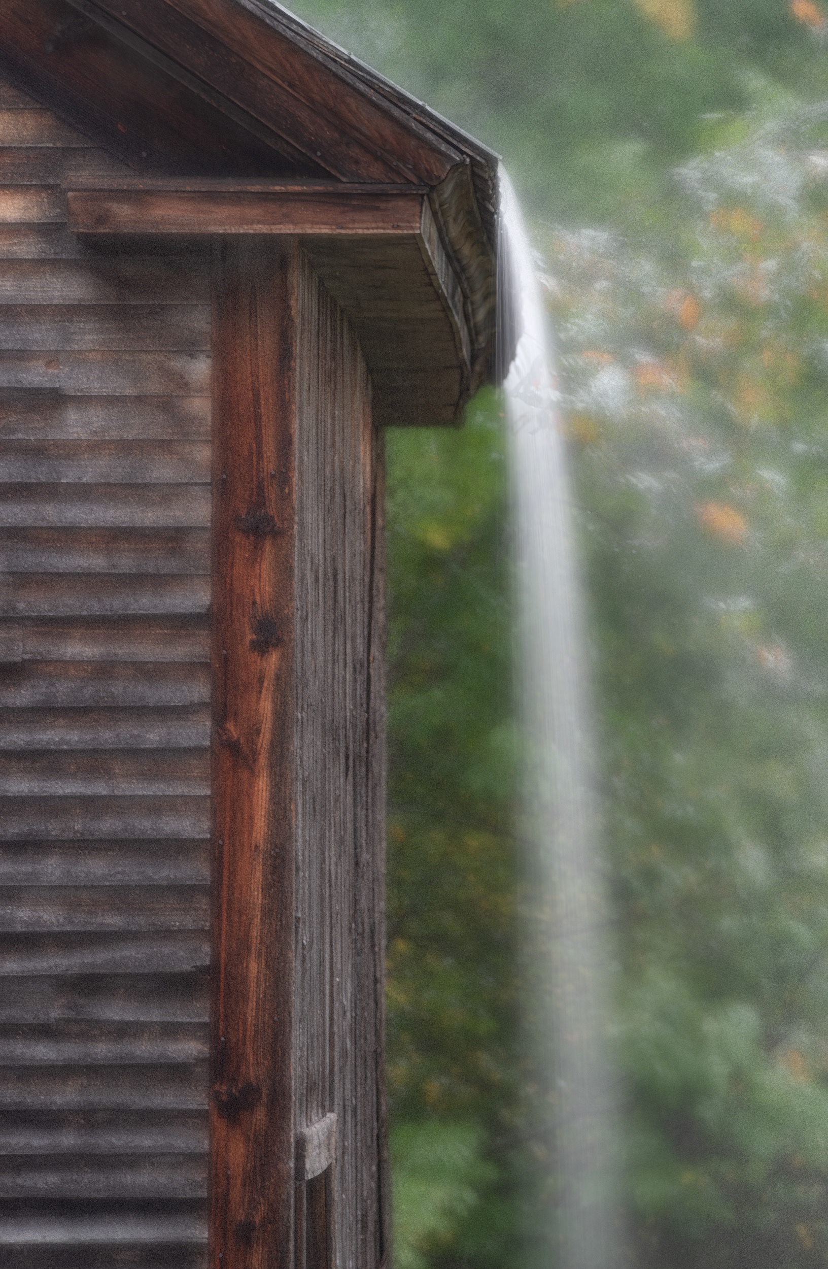 Big rain off the barn roof. Shot through my dining room window.