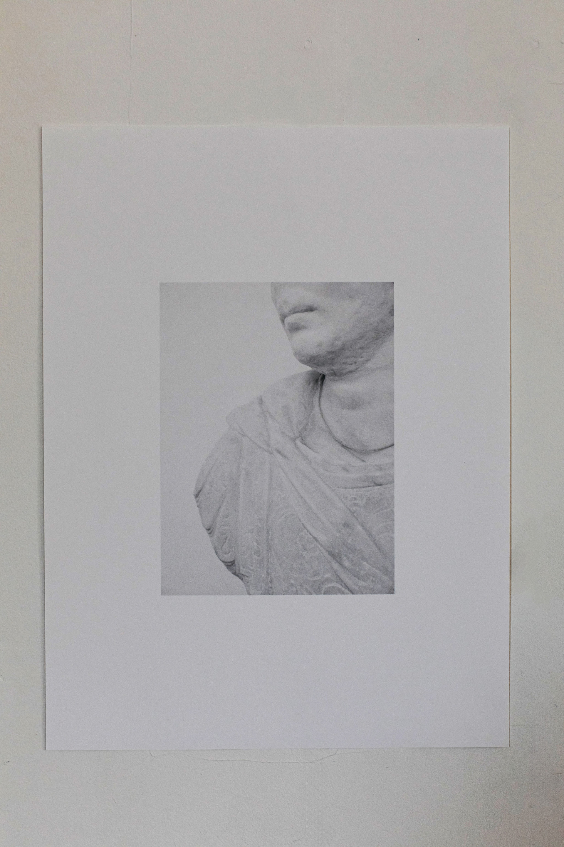 Digital print on cotton photo rag. Image Credit: Emma Croman. Installation view from Necrology exhibition (2025)