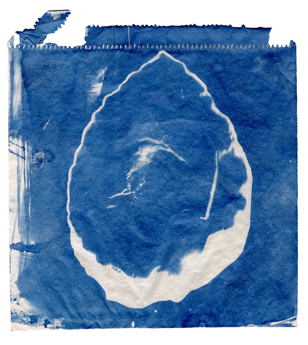 Cyanotype of a Handaxe on a bag from "The Beigel Shop"