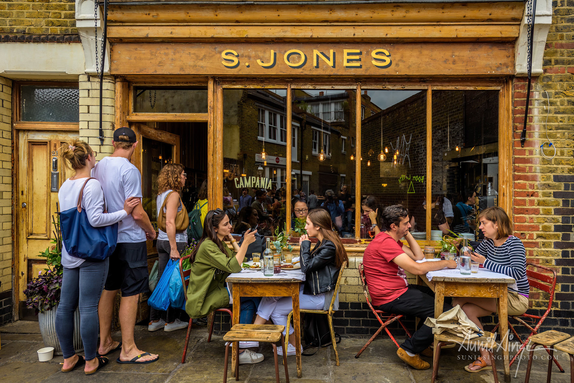 A neighborhood restaurant at Columbia flower market, London, UK, July 16, 2017