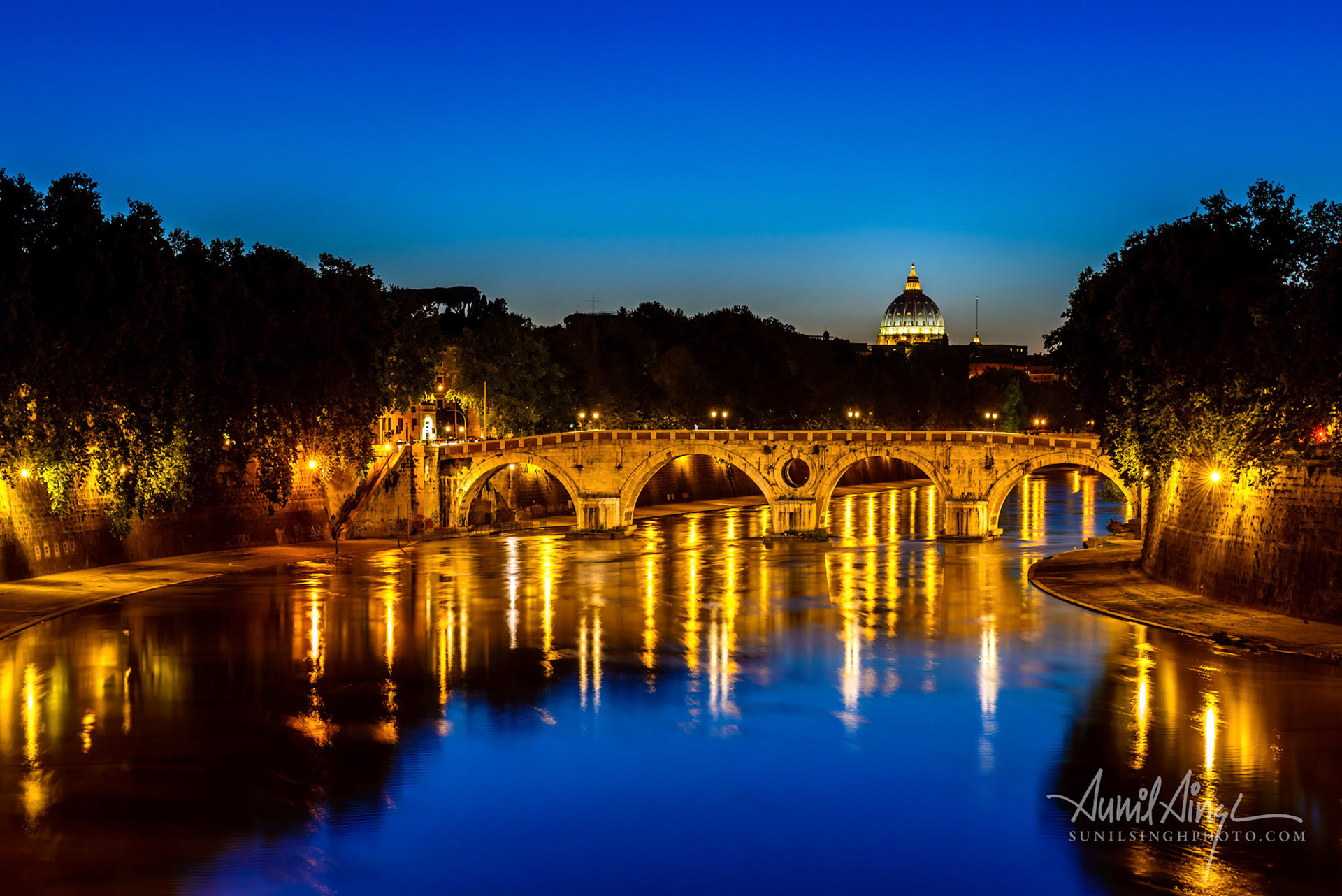 St Peter's Dome seen from Ponte Garibaldi, Rome, Italy
