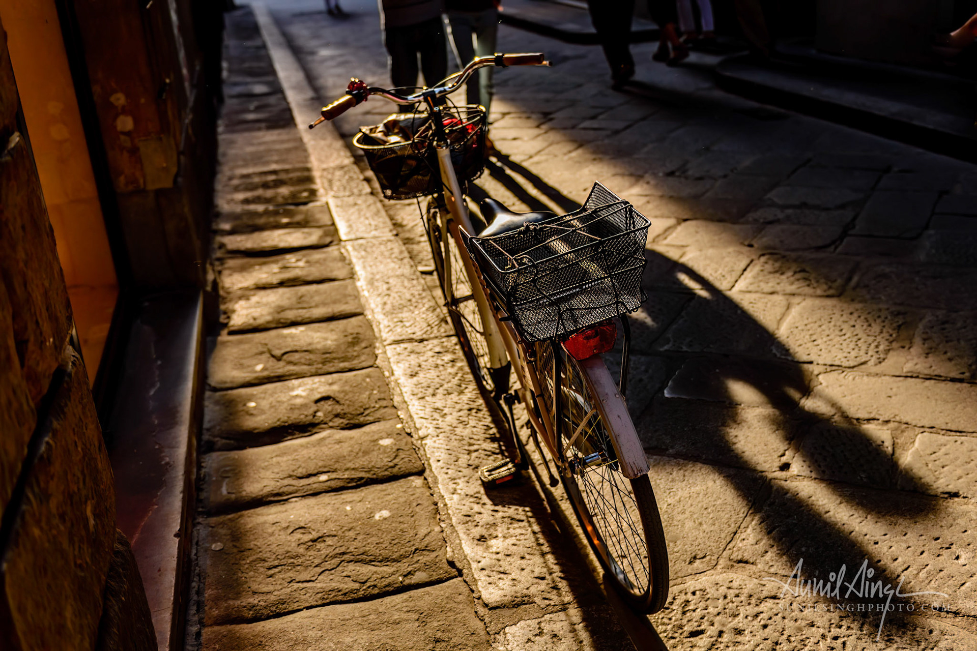Bike with shadow, Florence, Italy