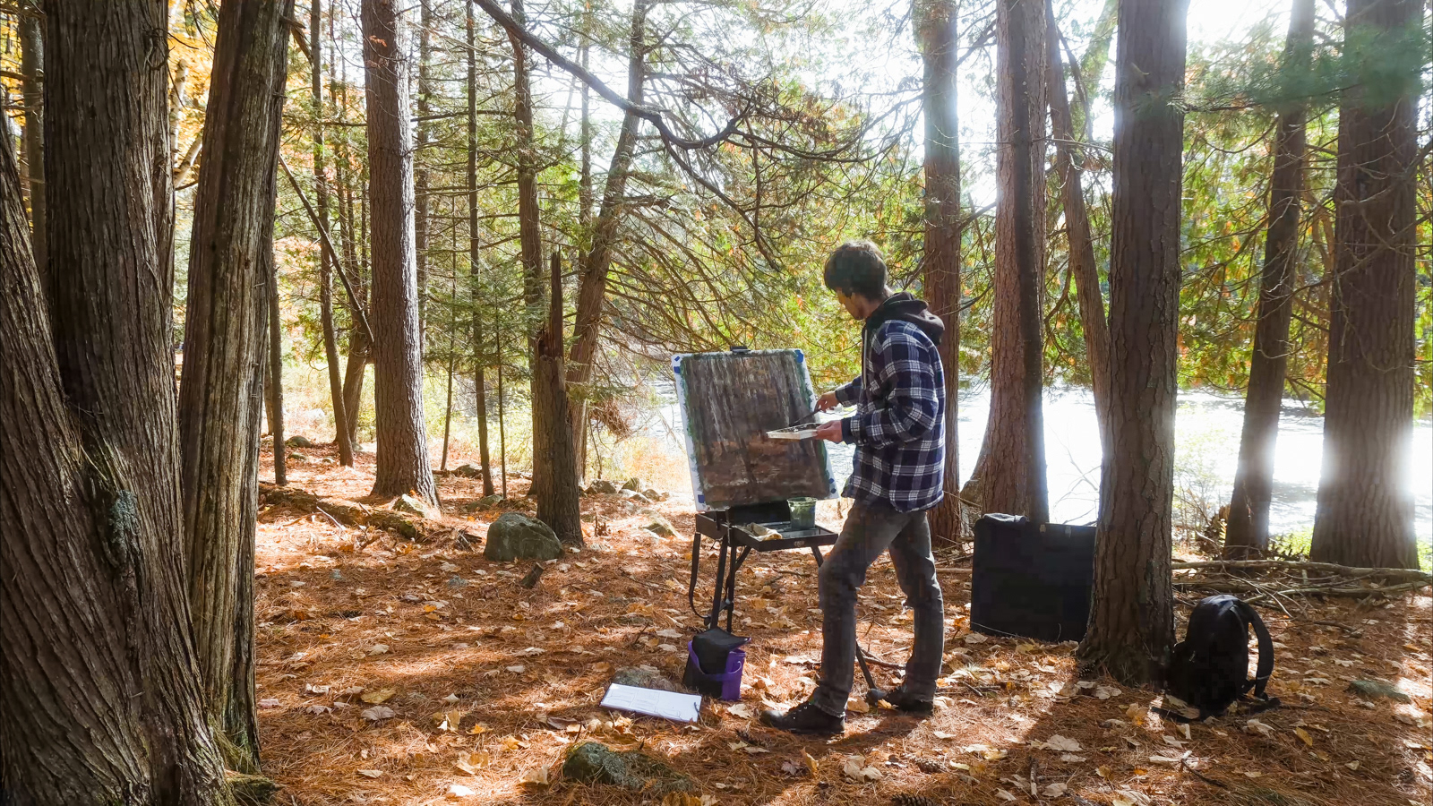 Curt painting one of his 'Forest ii' paintings in Foy Provincial Park Ontario 2023