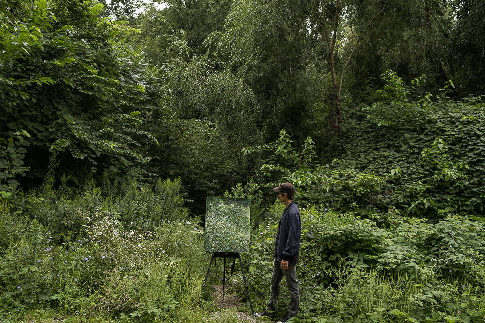 Curt with one of his 'Wildflowers' paintings in High Park, 2023