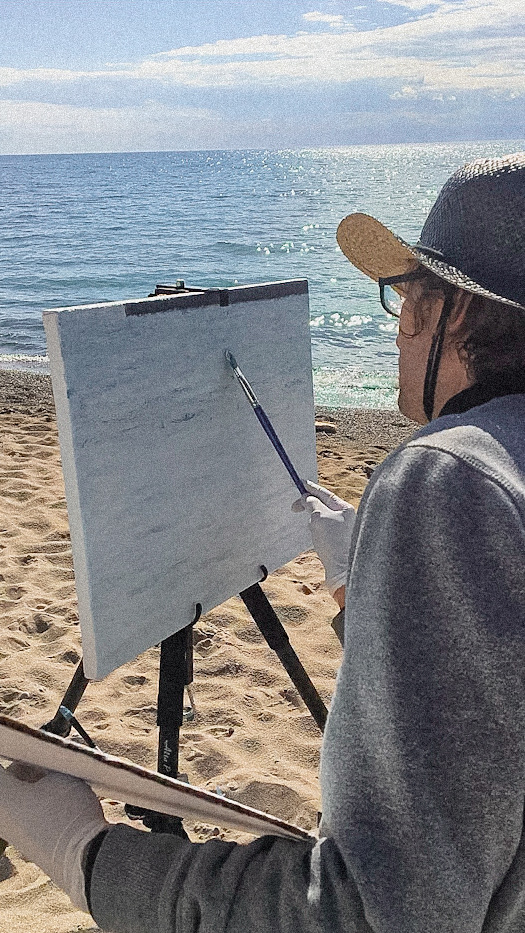 Curt painting on the beach in Kincardine