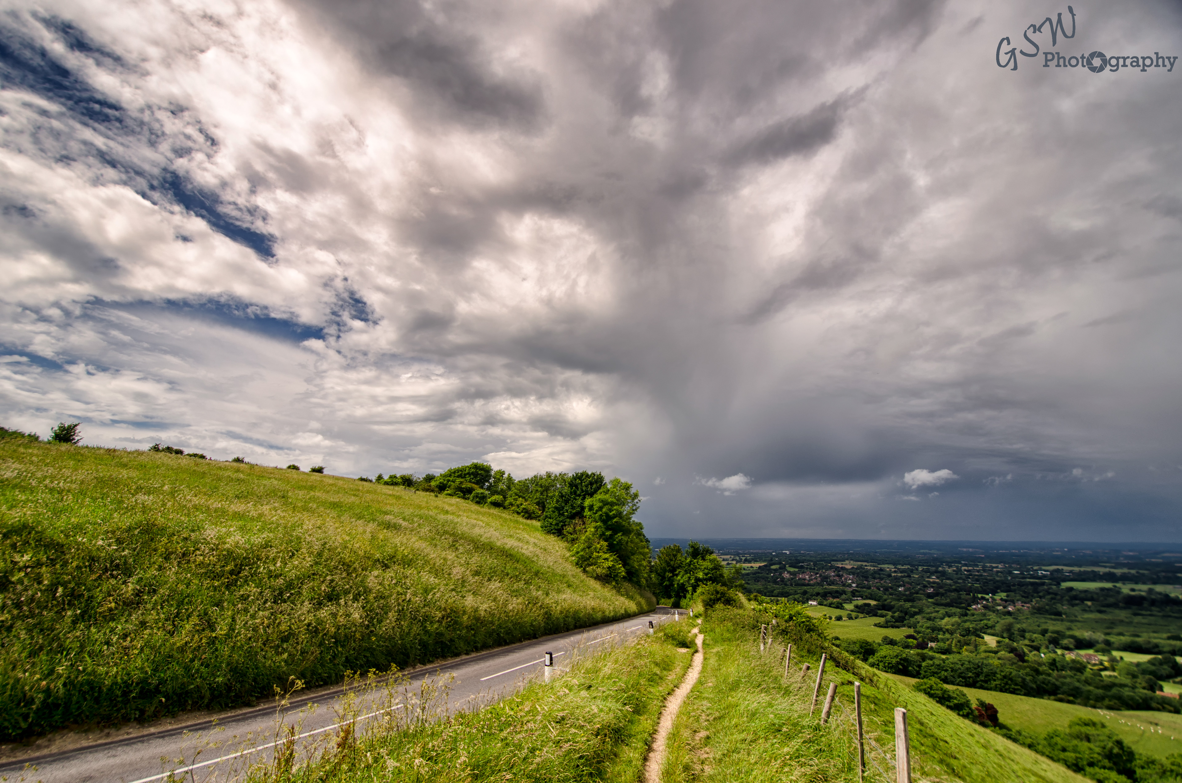 Sunshine to the left of me, clouds to the right, Sussex