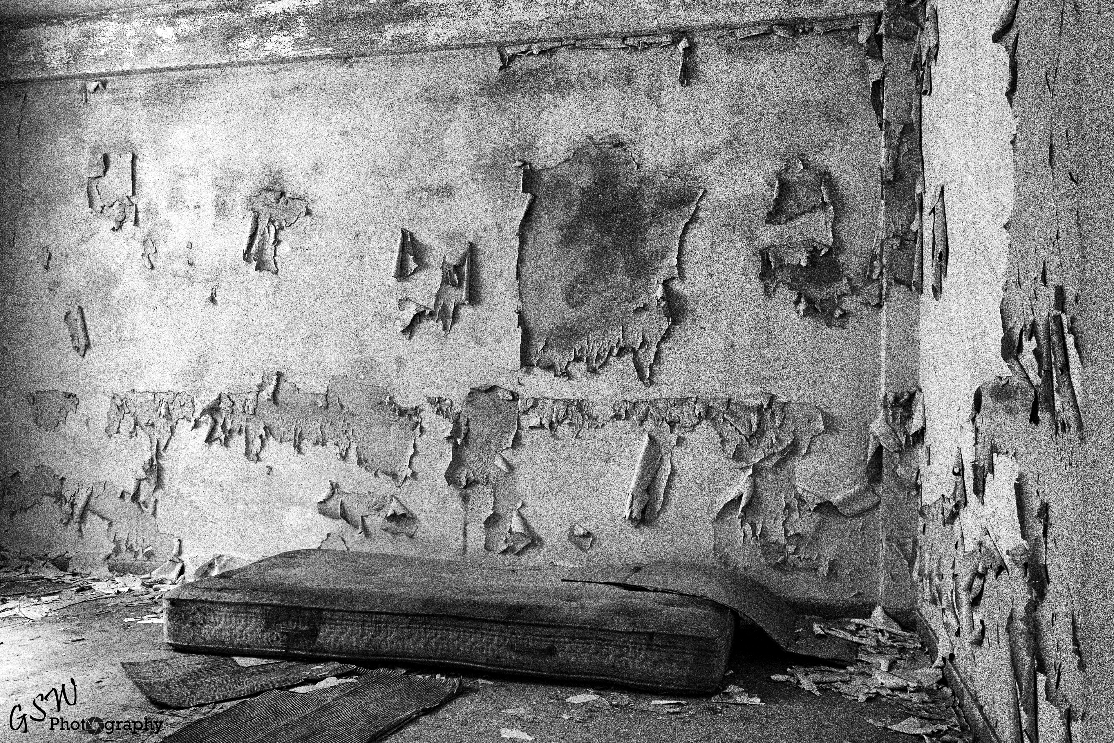 Mattress under peeling paint, Greece