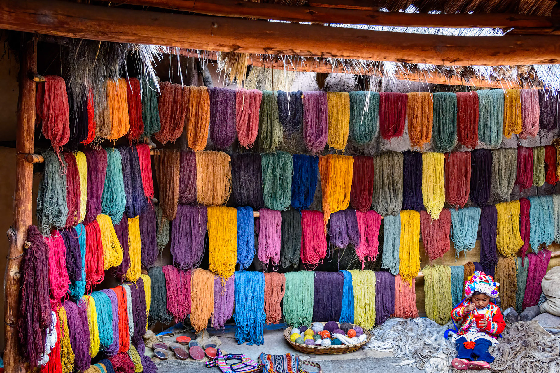 Snacking while Mom weaves