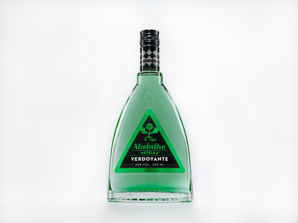 Absinthe Metelka Verdoyante - A bitter greenish liquor with anise and fennel flavour with an extract of wormwood, coriander, and spicies and herbs distillate. The first one of three types of our absinthes represents a Verdoyante’s tradition and proven quality. After dilution with cold water, a milk turbidity appears and this phenomenom is called a louche effect. This is characteristic of the Absinthe with a large portion of anise silica.