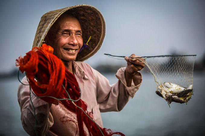 Very happy fisherman, Hoi An, Vietnam