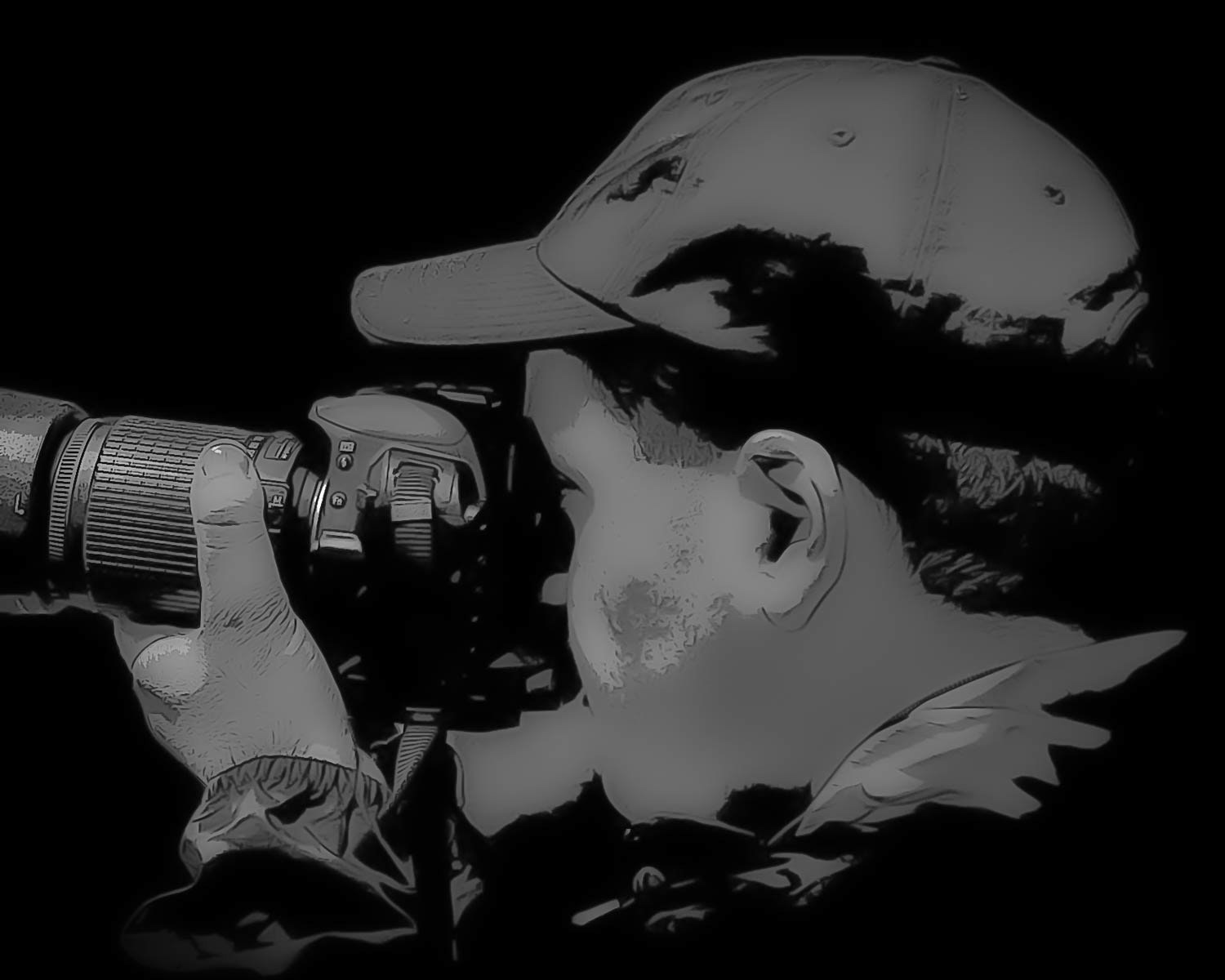 Image of a photographer holding a camera