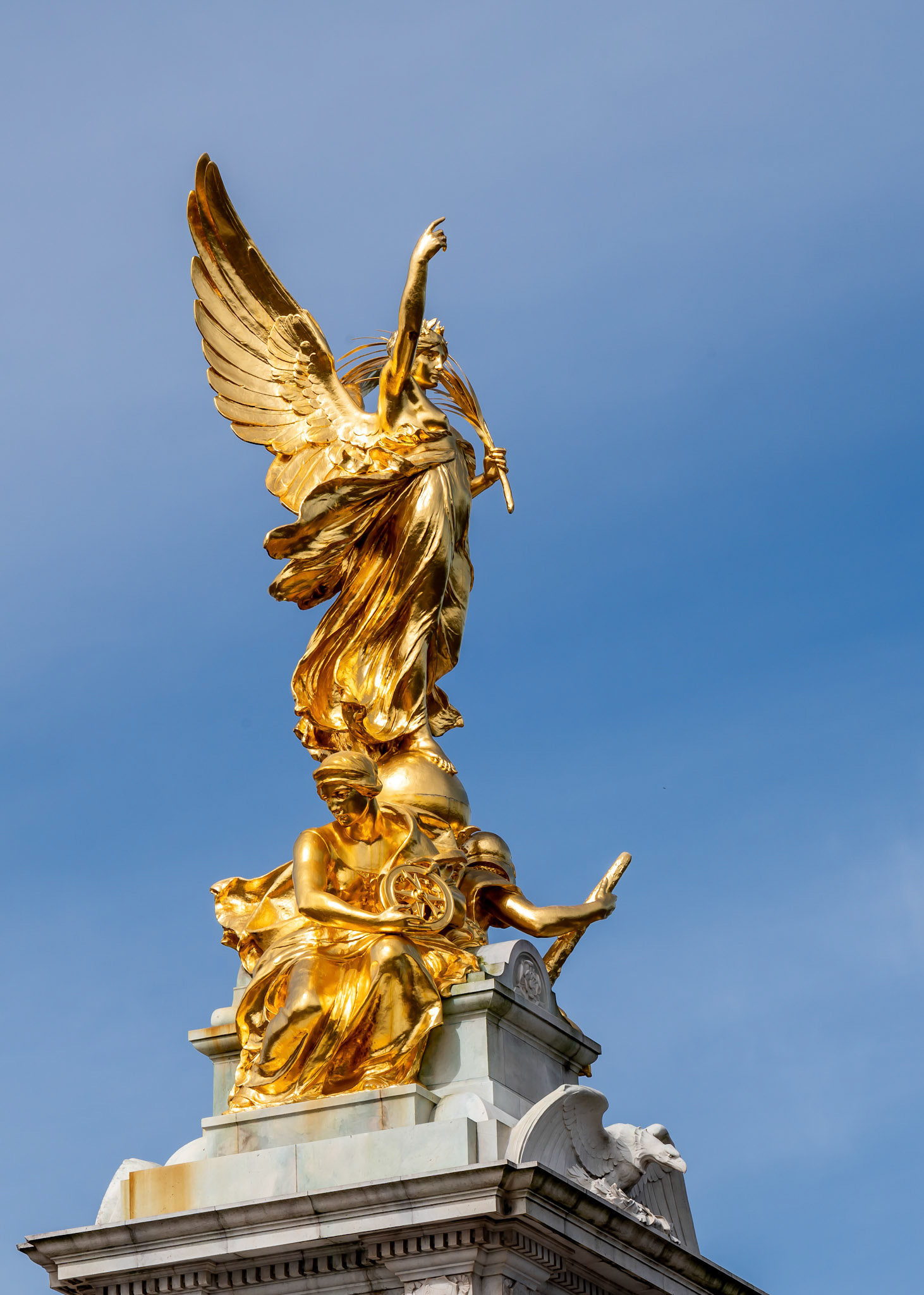 Winged Victory, the gilded bronze statue that sits atop the Victoria Memorial outside of Buckingham Palace.