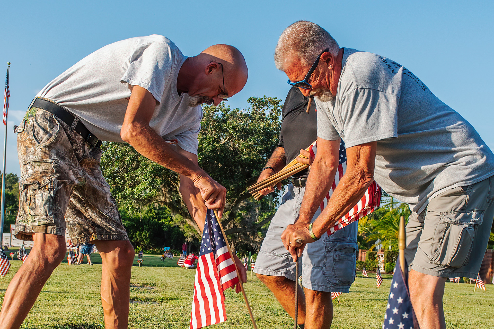 VFW Charlotte Post 5690 places flags on the graves of soldiers who gave their lives while serving the United States Military, at Restlawn Memorial Park, Port Charlotte, Friday May 22, 2020. 