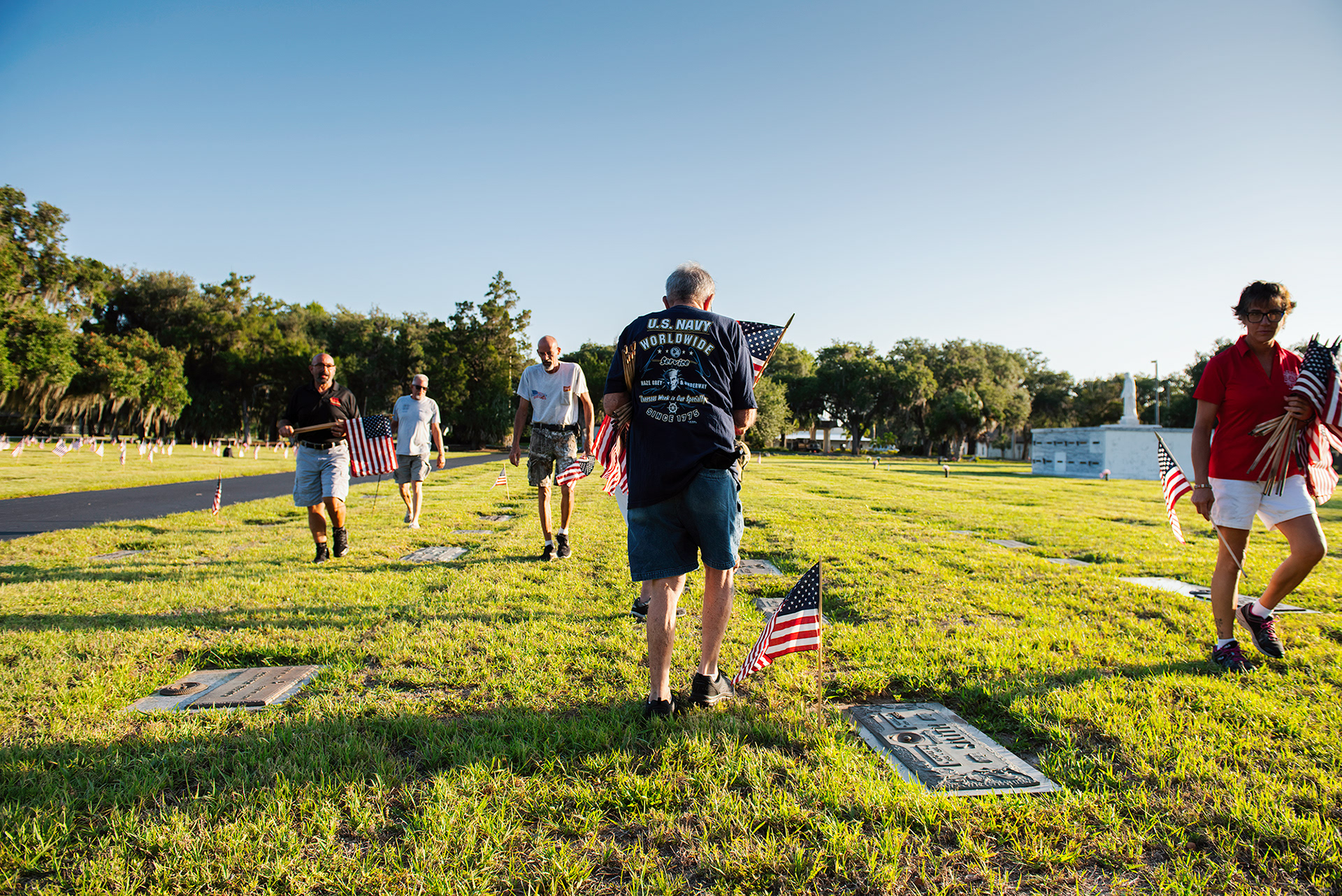 VFW Charlotte Post 5690 places flags on the graves of soldiers who gave their lives while serving the United States Military, at Restlawn Memorial Park, Port Charlotte, Friday May 22, 2020. 